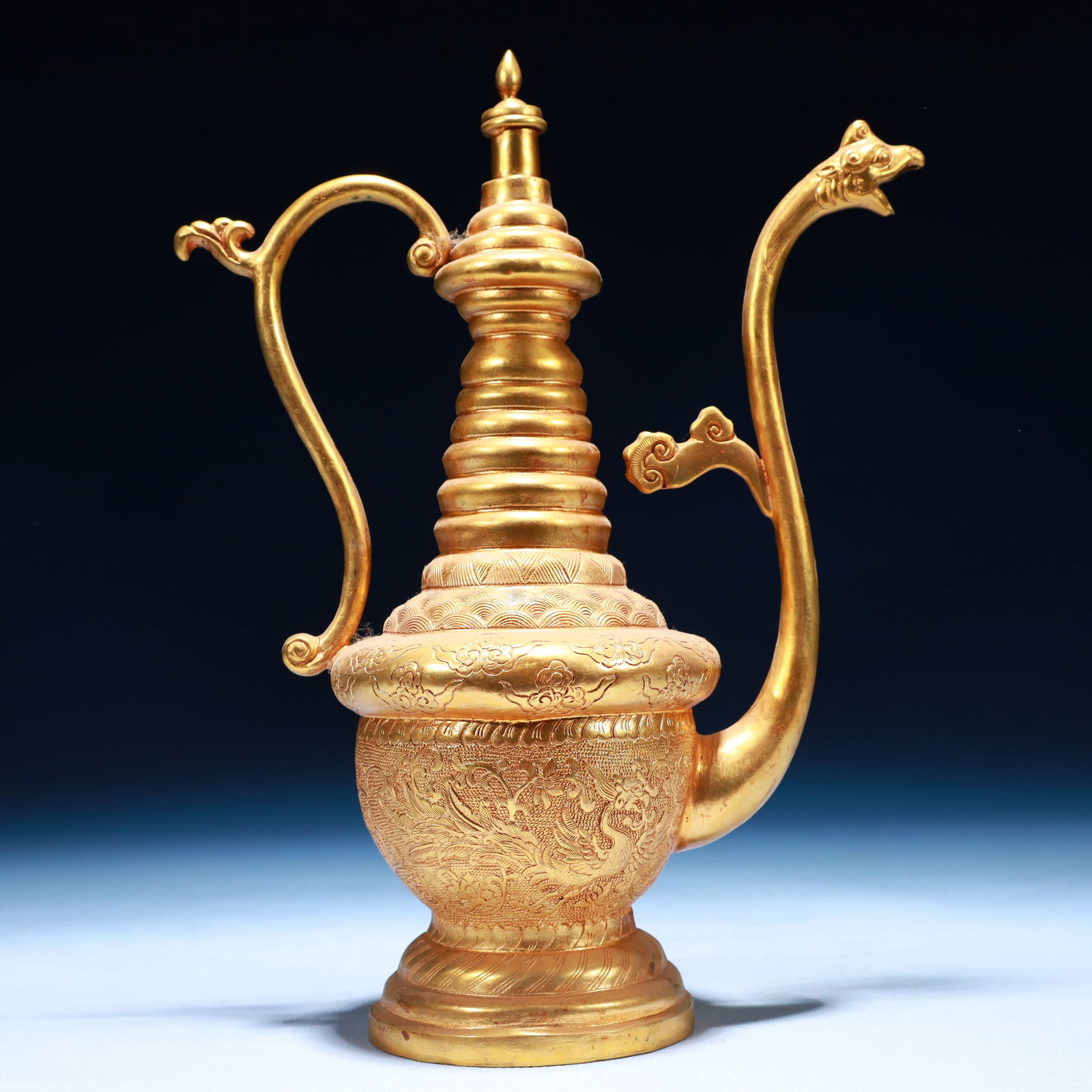 An Exquisite Gilt Bronze Phoenix Pattern Ewer: An Exquisite Gilt Bronze Phoenix Pattern Ewer,Tang Dynasty,China,Zhenguan Four-character Mark,Size:7.5inx3.9inx9.8in,Weight:800g 铜鎏金凤纹执壶,中ࢲ