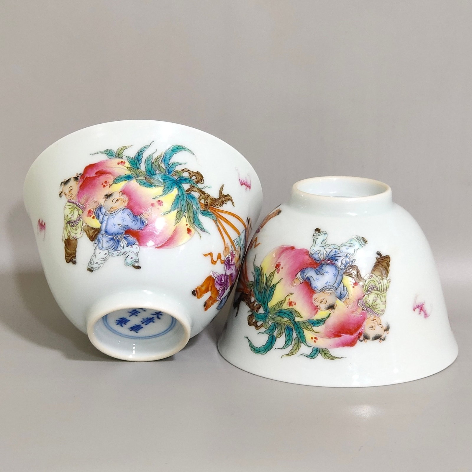 A Pair of Exquisite Famille-Rose Character and Story Pattern Cups,with poem: A Pair of Exquisite Famille-Rose Character and Story Pattern Cups,with poem,Qing Dynasty,China,Yongzheng Six-character Mark,Size:2.4inx3.5in 一对粉彩人物故