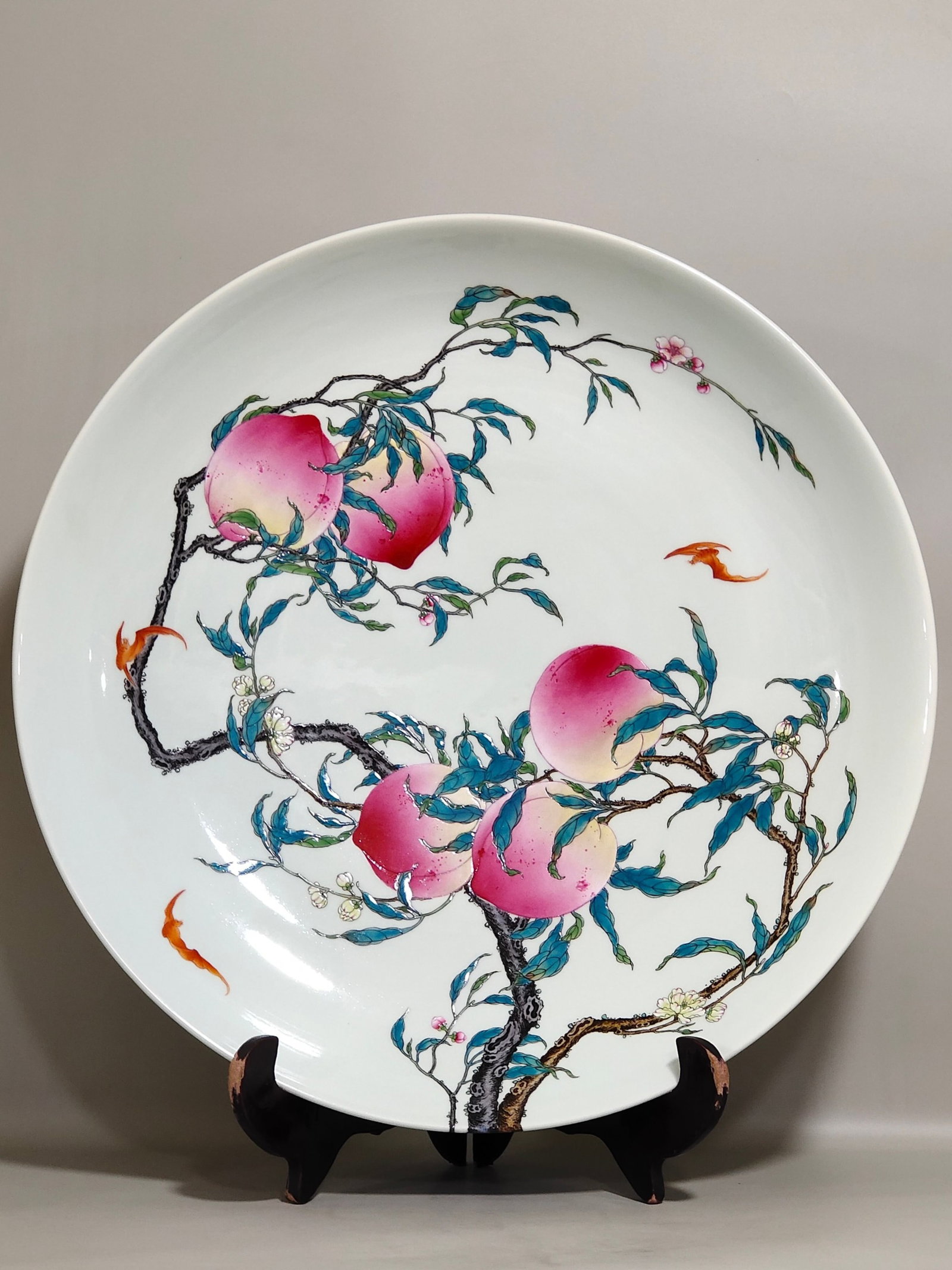 A Huge Famille-Rose Bats and Peach Pattern Plate: A Huge Famille-Rose Bats and Peach Pattern Plate,Qing Dynasty,China,Yongzheng Six-character Mark,Size:3.3inx18.8in 粉彩蝙蝠桃子纹盘子,中
