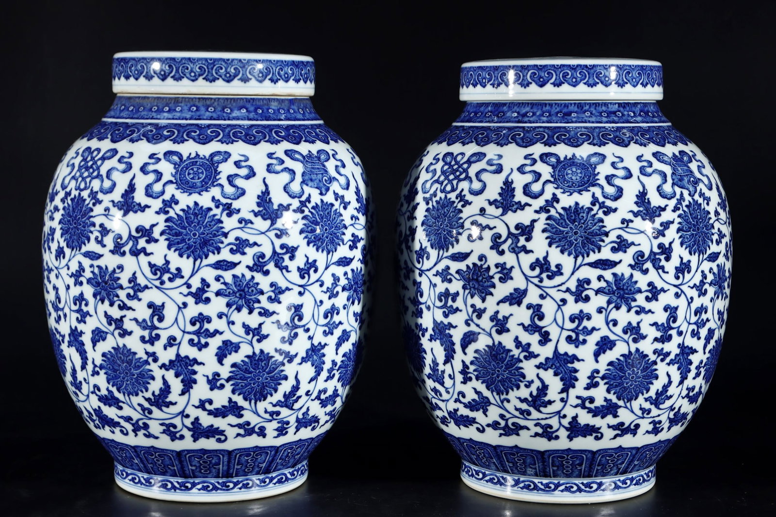 A Pair of Exquisite Blue and White Lotus Pattern Jar with Cover: A Pair of Exquisite Blue and White Lotus Pattern Jars with Cover,Qing Dynasty,China,Qianlong Six-character Mark,Size:14.2inx10.2in