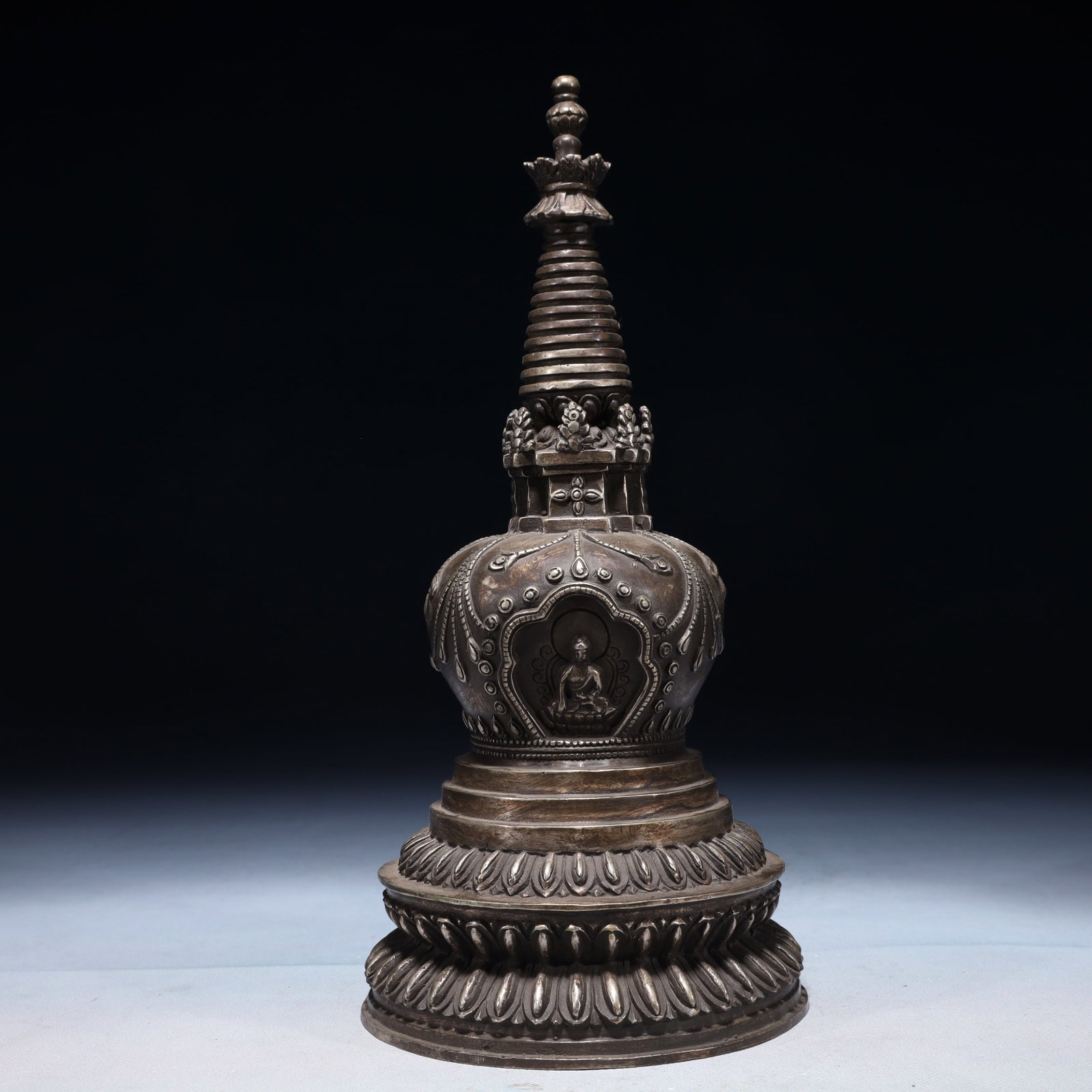 An Exquisite Silver-plated Bronze Buddha Statue Pattern Pagoda: An Exquisite Silver-plated Bronze Buddha Statue Pattern Pagoda,Qing Dynasty,China,Size:5.5inx11in,Weight:1550g 铜镀银佛像纹佛塔,中国清