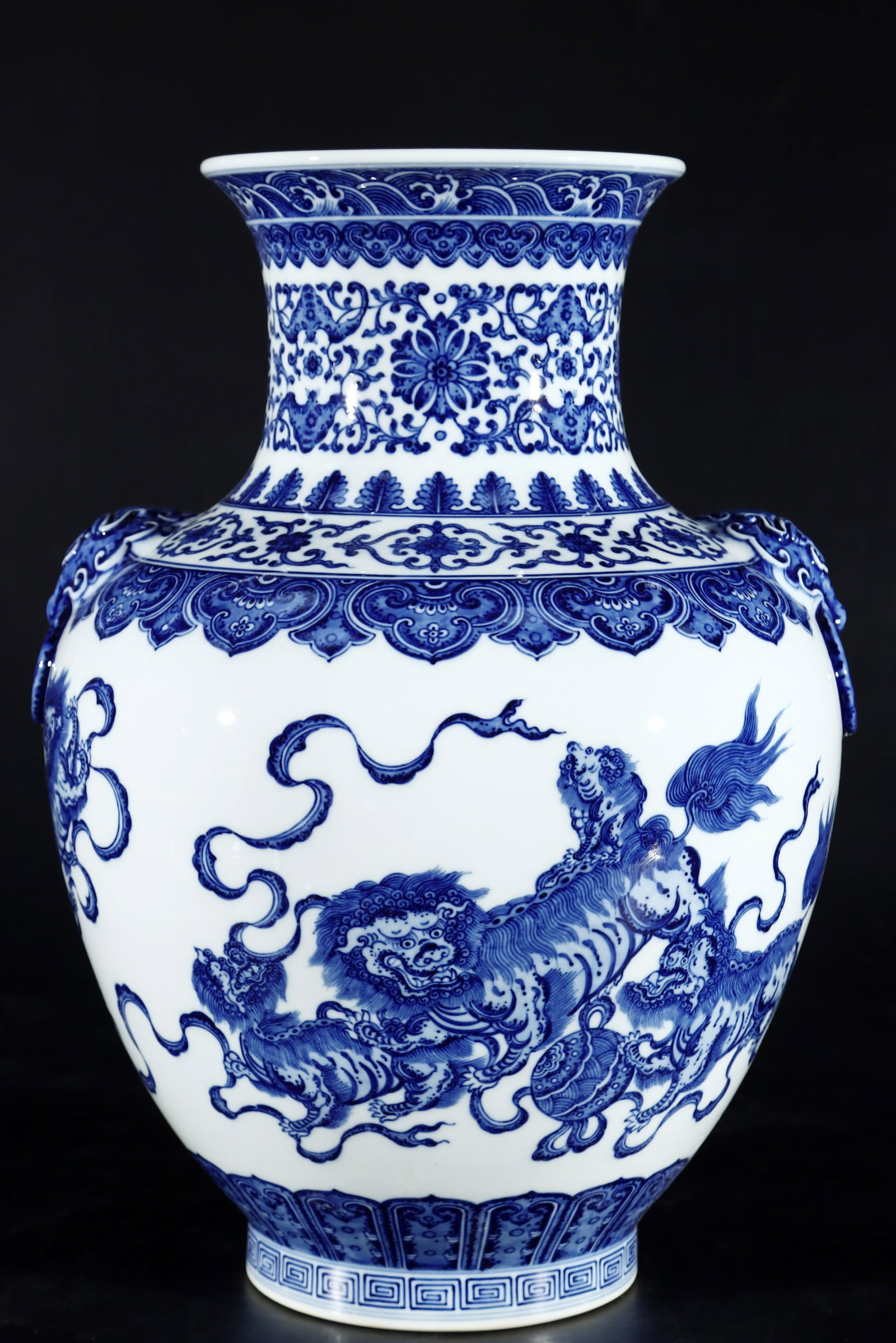 An Exquisite Blue and White Lion Pattern Beast-Ears Vase: An Exquisite Blue and White Lion Pattern Beast-Ears Vase,Qing Dynasty,China,Qianlong Six-character Mark,Size:15.7inx11.3in 青花狮子纹兽耳瓶,中