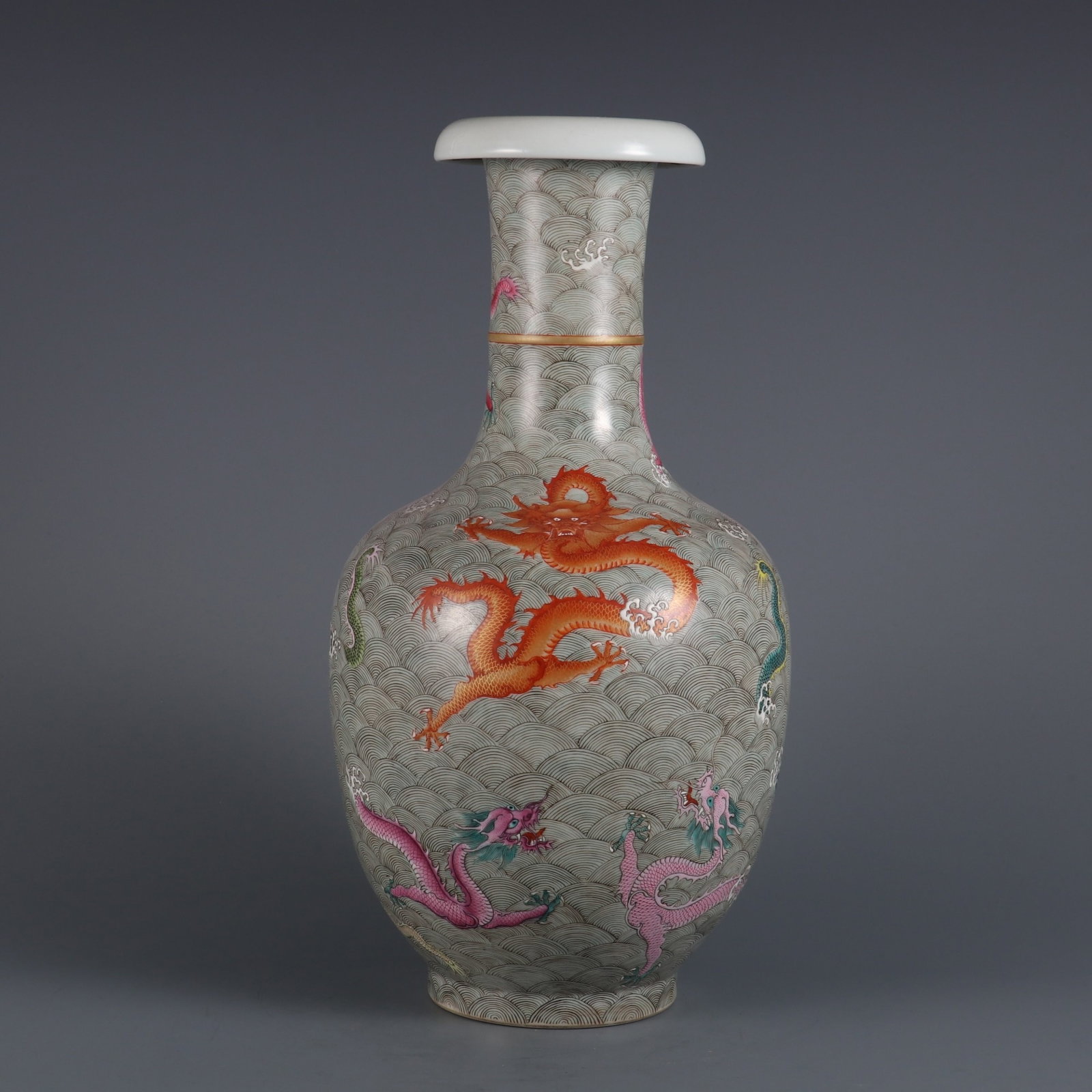 A Rare Famille-Rose Seawater and Dragon Pattern Vase: A Rare Famille-Rose Seawater and Dragon Pattern Vase,Qing Dynasty,China,Qianlong Six-character Mark,Size:12.6inx3.7in