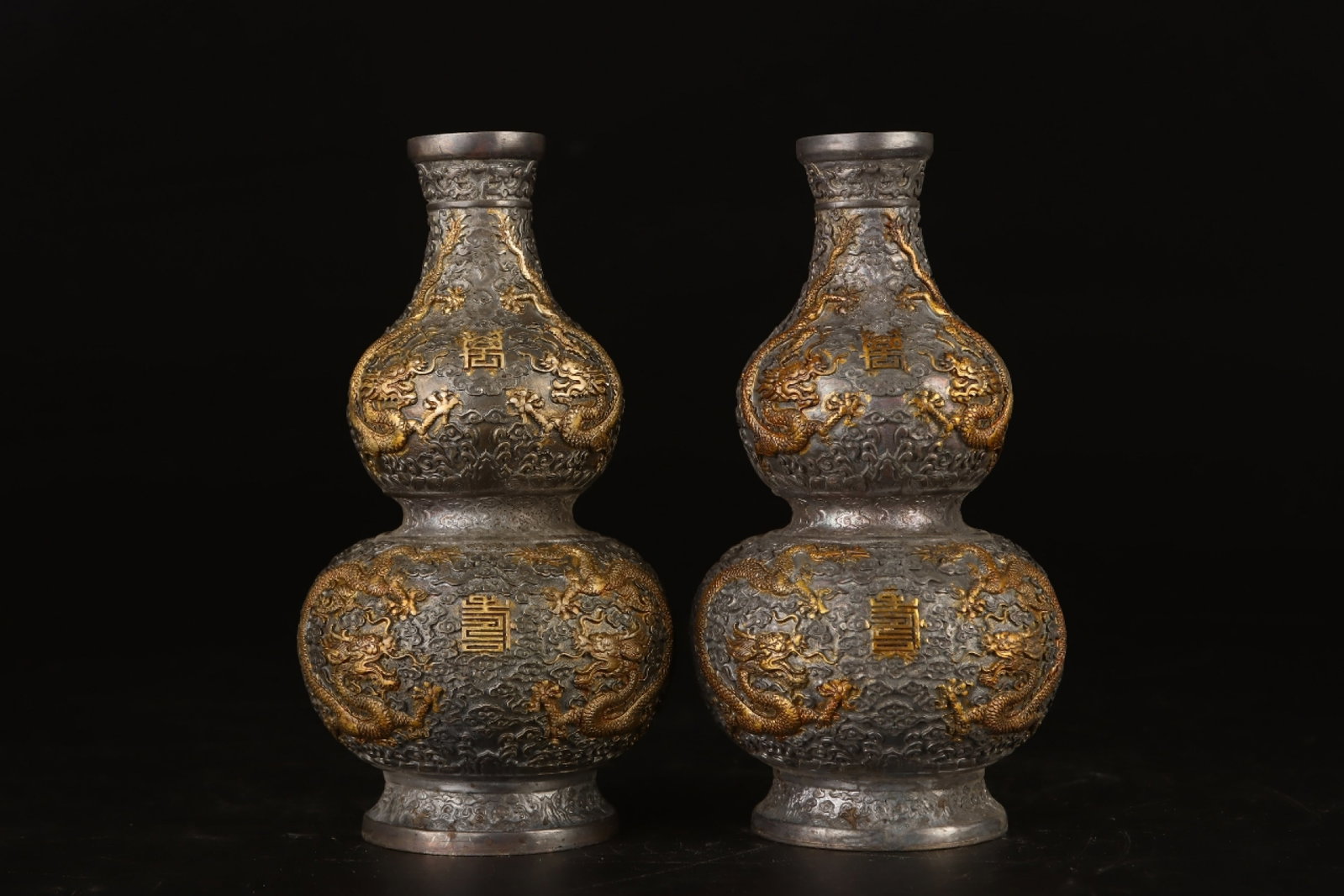 A Pair of Exquisite Gilt Bronze Auspicious Cloud and Dragon Pattern Gourd Vases: A Pair of Exquisite Gilt Bronze Auspicious Cloud and Dragon Pattern Gourd Vases,Qing Dynasty, China,Qianlong Four-character Mark,Size:7.1inx3.5in Weight:505g 一对铜鎏金&#