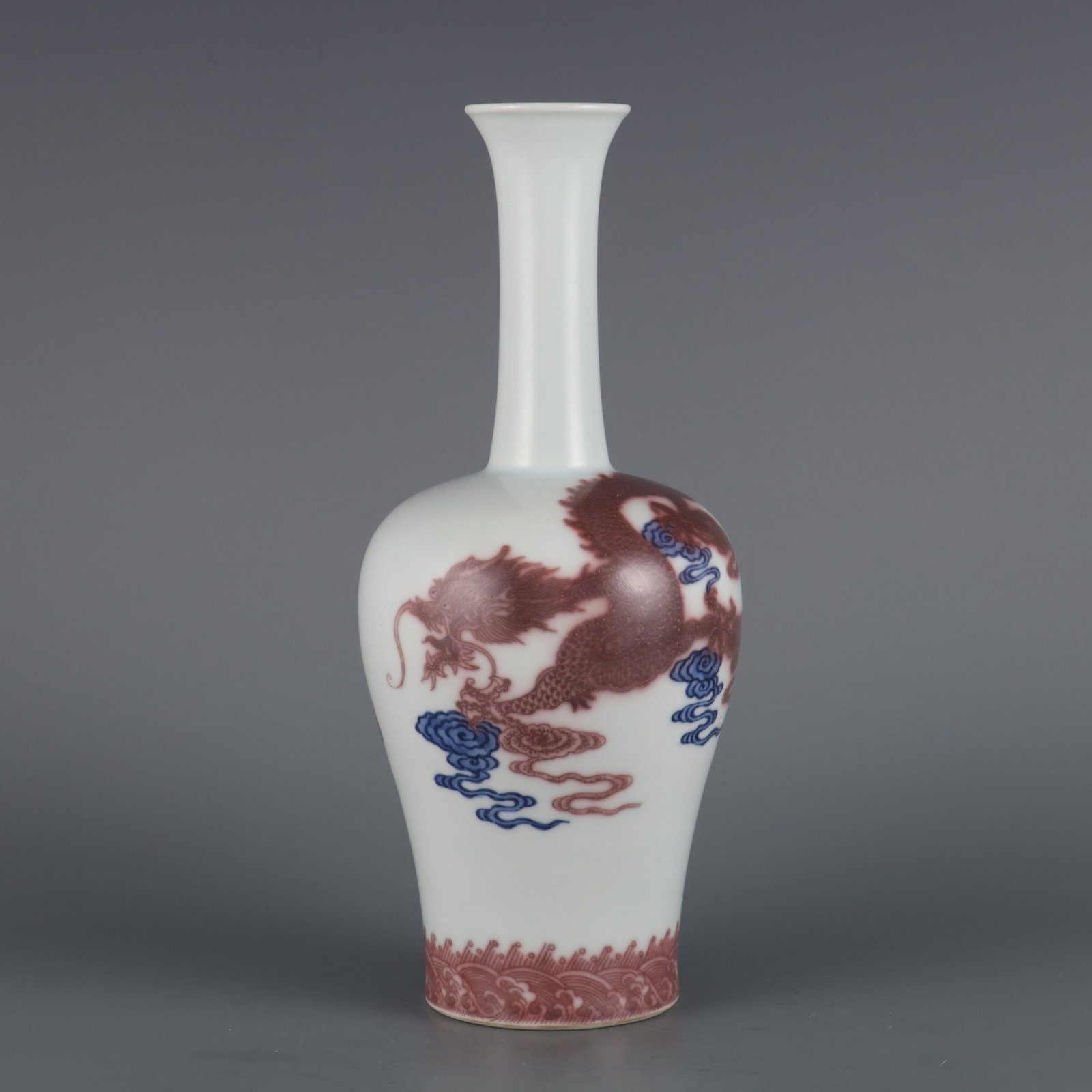 An Exquisite Blue and White Underglaze-Red Auspicious Cloud and Dragon Pattern Vase: An Exquisite Blue and White Underglaze-Red Auspicious Cloud and Dragon Pattern Vase,Qing Dynasty,China,Qianlong Six-character Mark,Size:10.4inx1.8in
