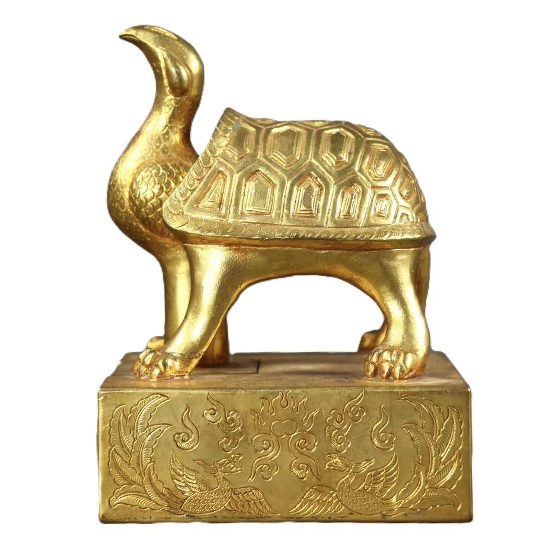 An Exquisite Gilt Bronze Auspicious Cloud and Phoenix Pattern Seal: An Exquisite Gilt Bronze Auspicious Cloud and Phoenix Pattern Seal,Qing Dynasty,China,With Mark,Size:5.7inx4.1in,Weight:4586g 铜鎏金祥云凤纹印章,&
