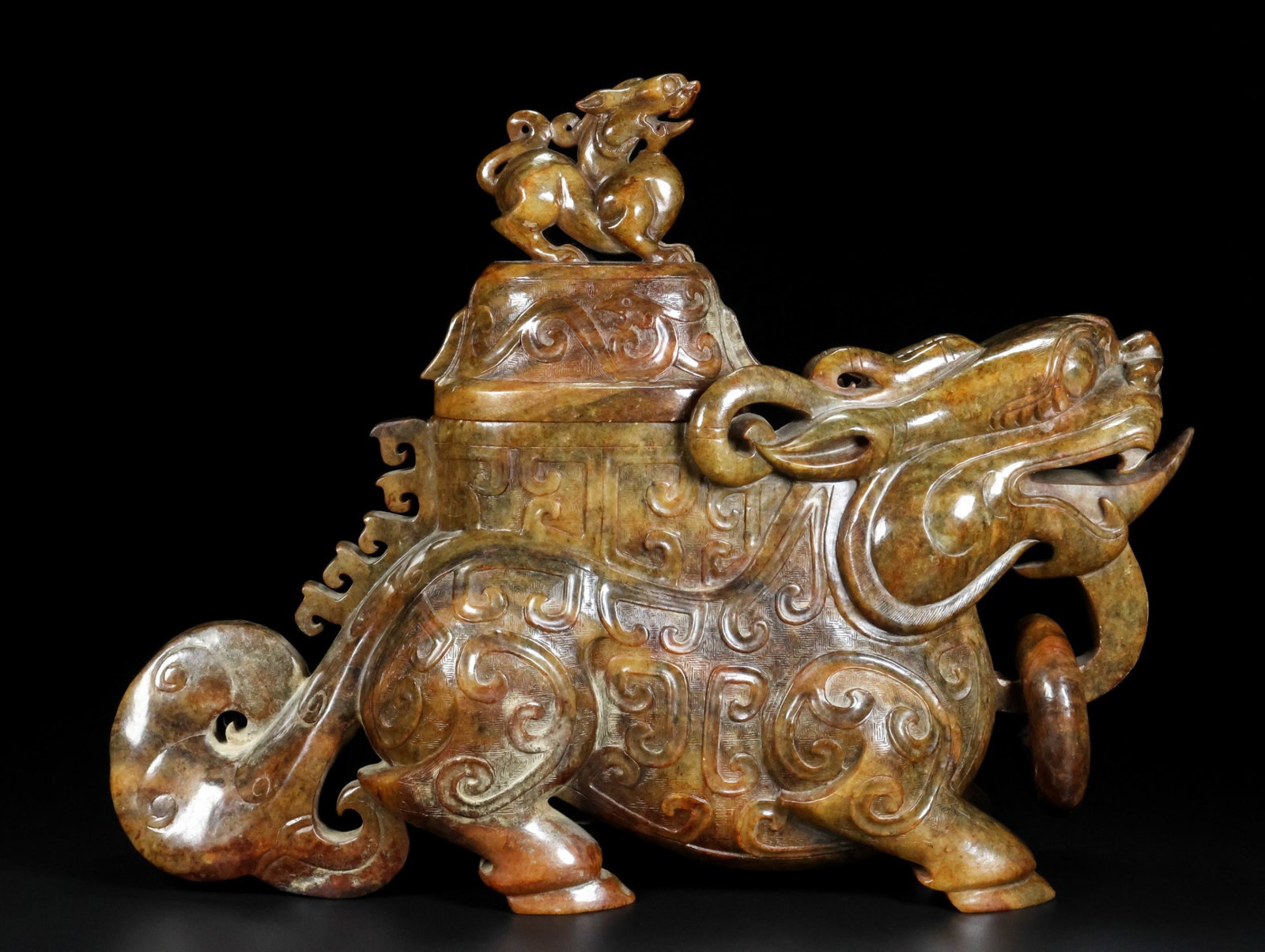 An Exquisite Archaic Jade Auspicious Beast Censer (1 of 8)