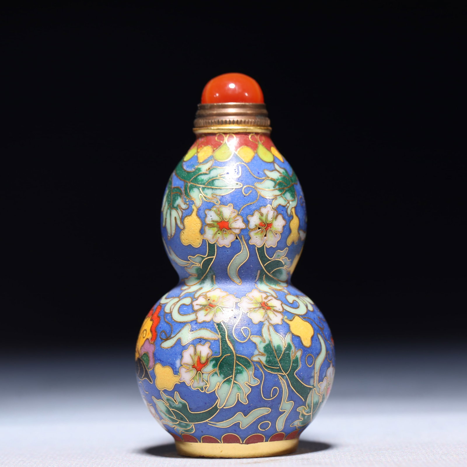 An Exquisite Cloisonne Flower and Butterfly Pattern Snuff Bottle: An Exquisite Cloisonne Flower and Butterfly Pattern Snuff Bottle,Qing Dynasty,China,Size:1.6inx3.1in,Weight:72.7g 景泰蓝花卉蝴蝶纹鼻烟ࣥ