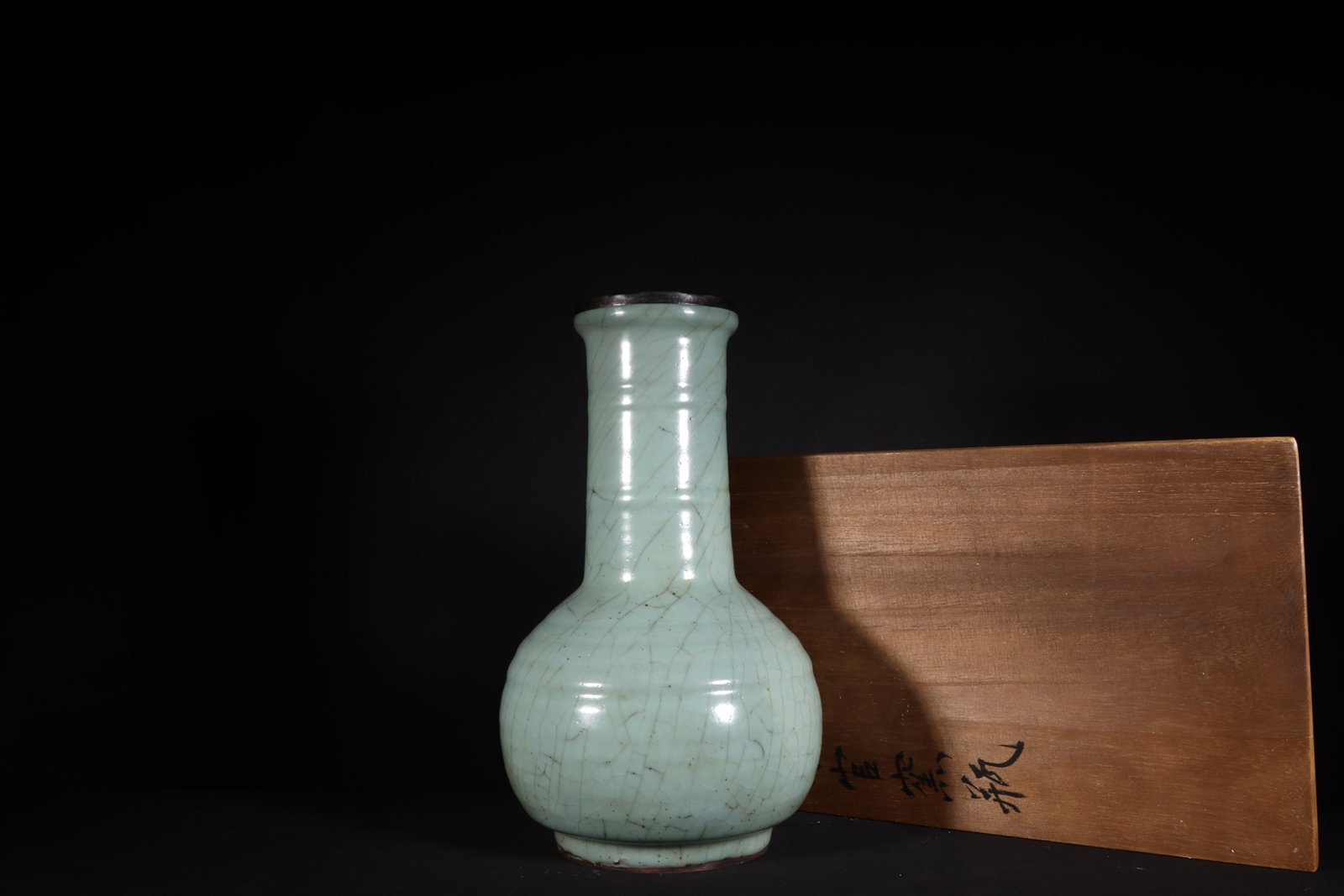 An Exquisite Guan yao Celadon Glazed Inlaid Silver Vase,with an Imperial Poem by Emperor Qianlong: An Exquisite Guan yao Celadon Glazed Inlaid Silver Vase,with an Imperial Poem by Emperor Qianlong,Song Dynasty,China,Size:10.9inx6.7in 官窑粉青釉镶银瓶&