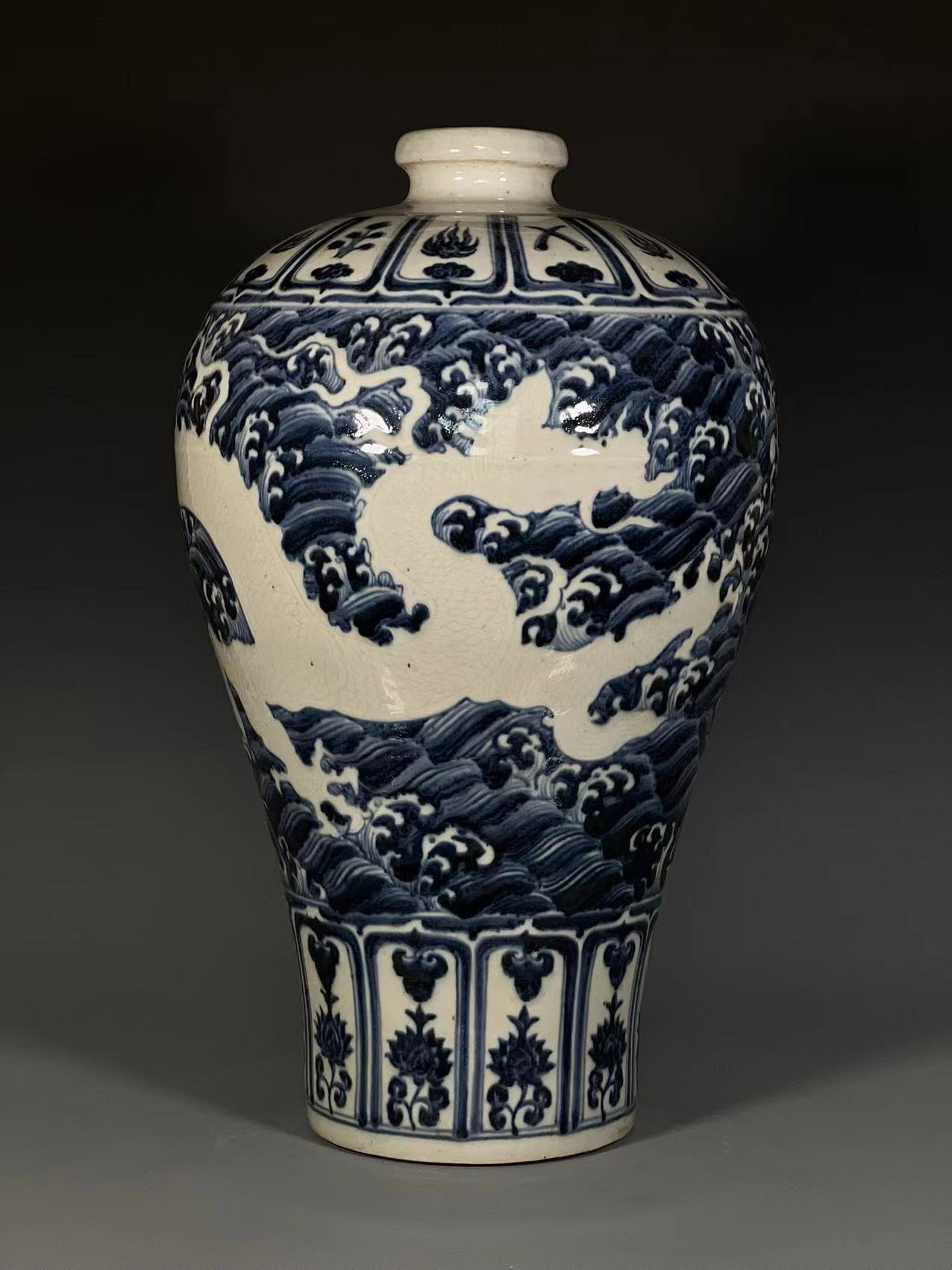 A Huge Blue and White Seawater and Dragon Pattern Vase: A Huge Blue and White Seawater and Dragon Pattern Vase,Qing Dynasty,China,Size:20.7inx6.9in 青花海水龙纹瓶,中国清代