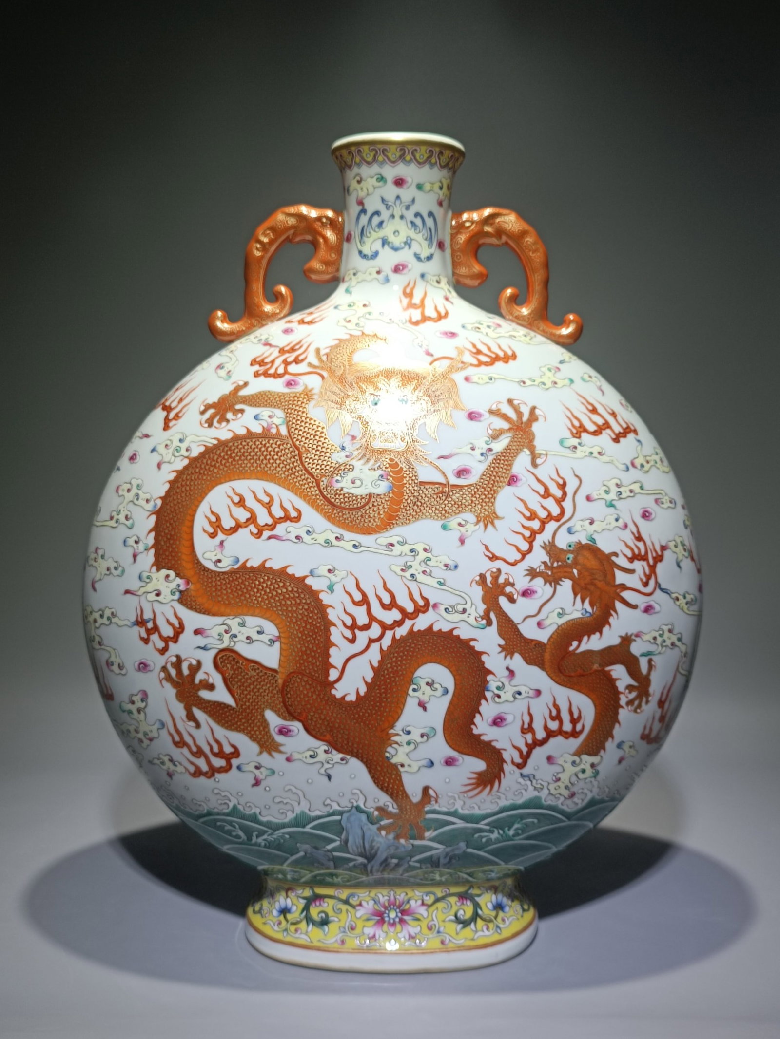 A Huge Famille-Rose Auspicious Cloud and Dragon Pattern Double-Ears Vase: A Huge Famille-Rose Auspicious Cloud and Dragon Pattern Double-Ears Vase,Qing Dynasty,China,Qianlong Six-character Mark,Size:19.3inx14.6in 粉彩祥云龙纹双ň
