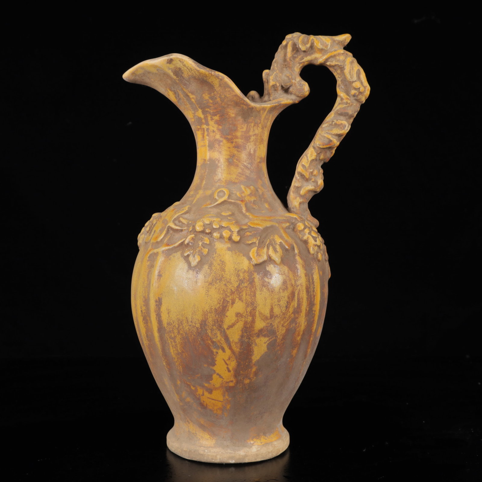An Exquisite Tang Tri-Color Glazed Pottery Flower Pattern Ewer (1 of 13)