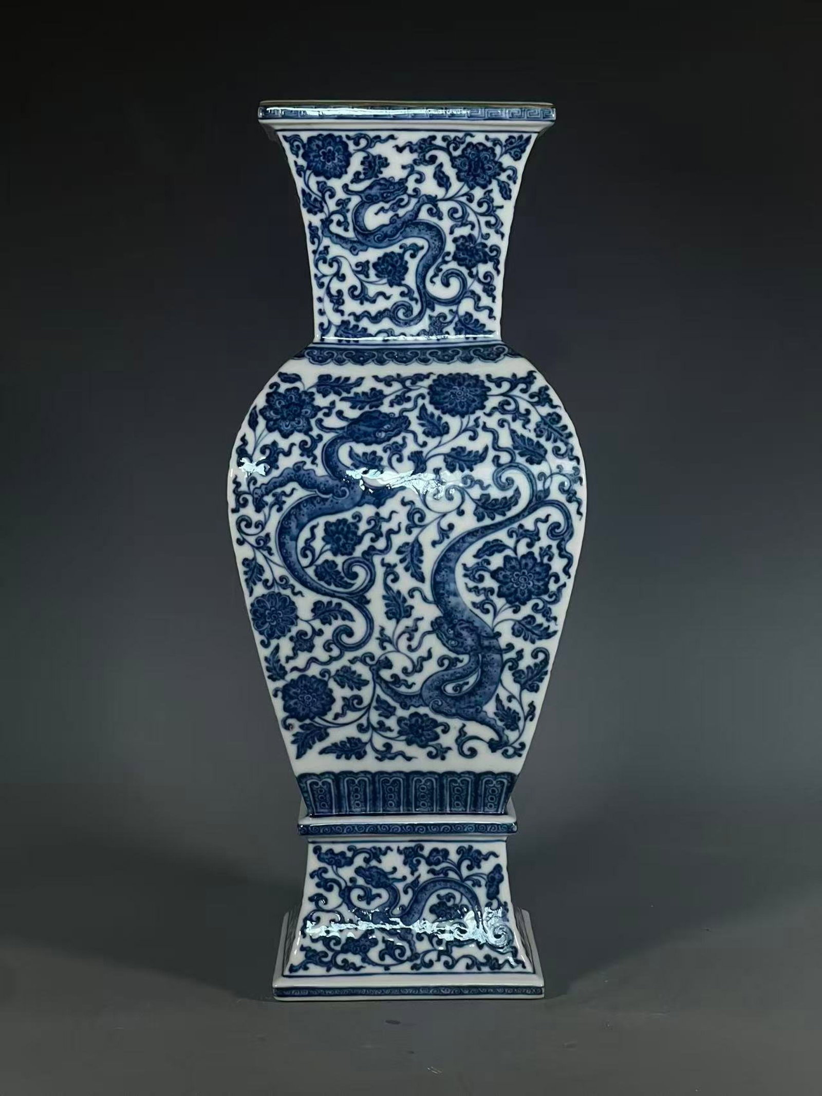 A Huge Blue and White Lotus and Dragon Pattern Vase: A Huge Blue and White Lotus and Dragon Pattern Vase,Qing Dynasty,China,Qianlong Six-character Mark,Size:17.1inx5.5in 青花缠枝莲龙纹瓶,中国&#