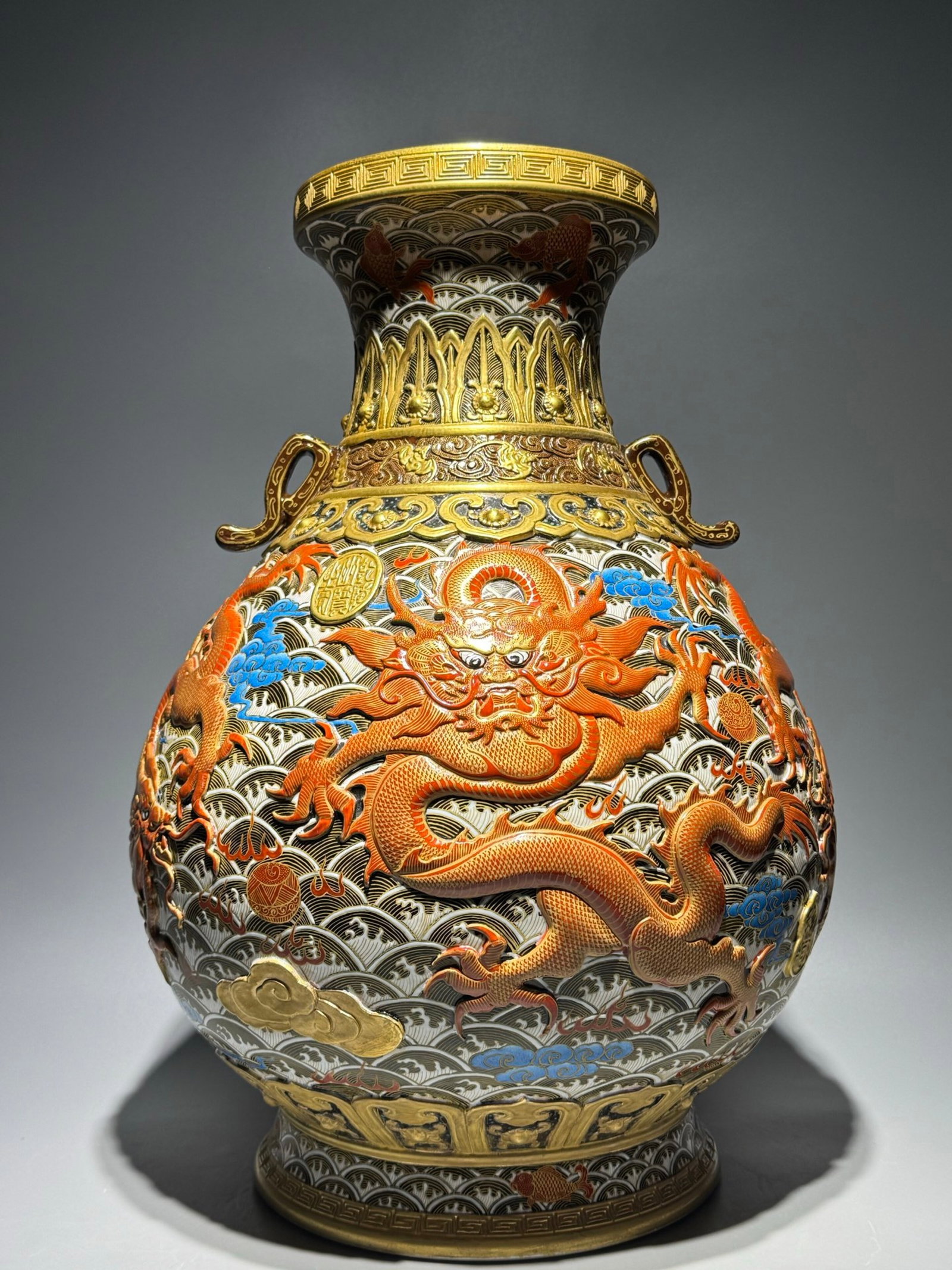 A Huge Enamel Iron-Red Painted Gold Seawater and Dragon Pattern Double-Ears Vase: A Huge Enamel Iron-Red Painted Gold Seawater and Dragon Pattern Double-Ears Vase,Qing Dynasty,China,Qianlong Six-character Mark,Size:18.7inx13.4in 珐琅彩矾红描ŵ