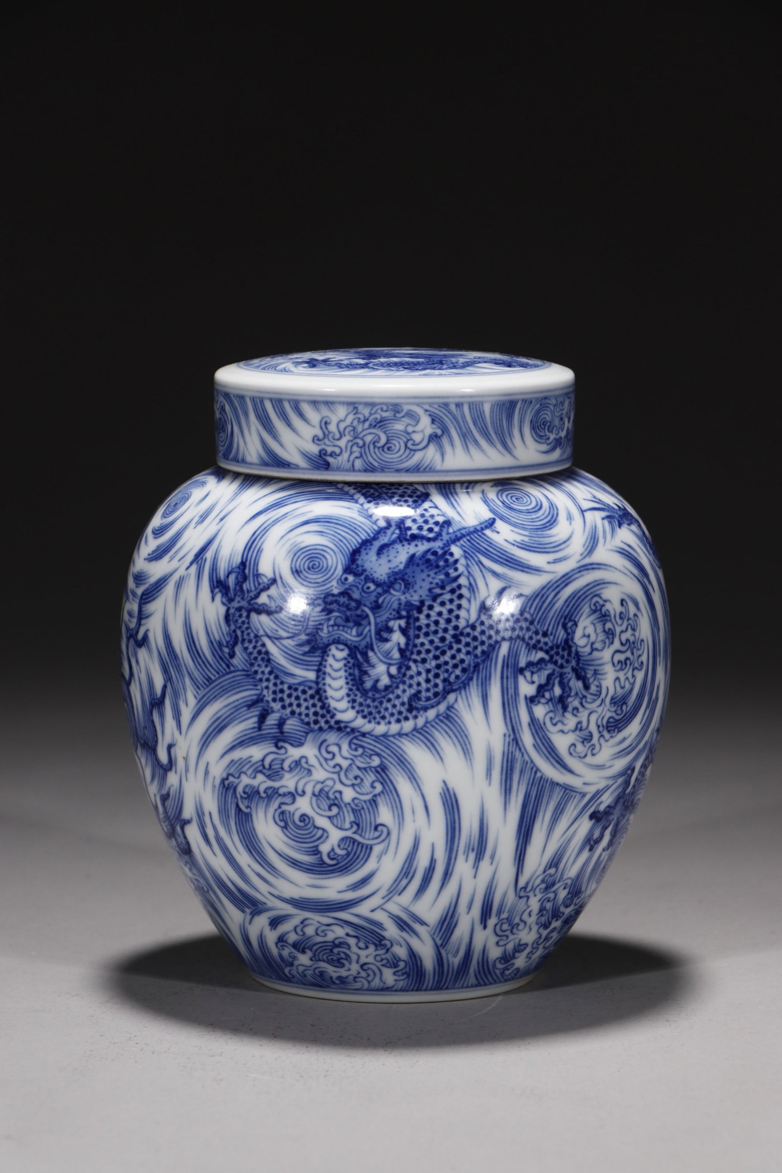 An Exquisite Blue and White Seawater and Dragon Pattern Jar: An Exquisite Blue and White Seawater and Dragon Pattern Jar,Qing Dynasty,China,Qianlong Six-character Mark,Size:5.9in