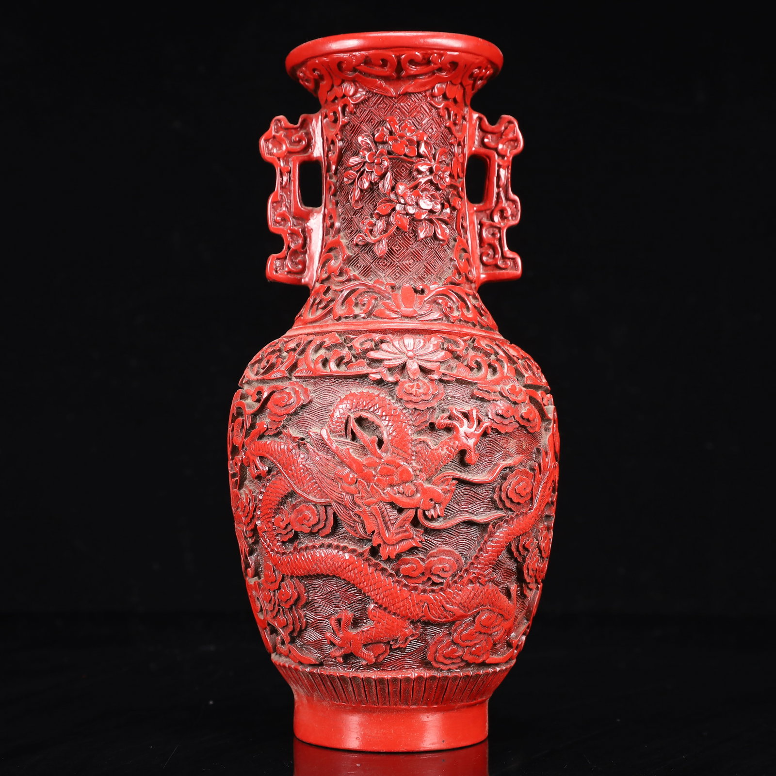 An Exquisite Carved Red Lacquer Auspicious Cloud and Dragon Pattern Double-Ears Vase: An Exquisite Carved Red Lacquer Auspicious Cloud and Dragon Pattern Double-Ears Vase,Qing Dynasty, China,Qianlong Four-character Mark,Size:4.3inx9.8in,Weight:900g 剔红漆器Ķ