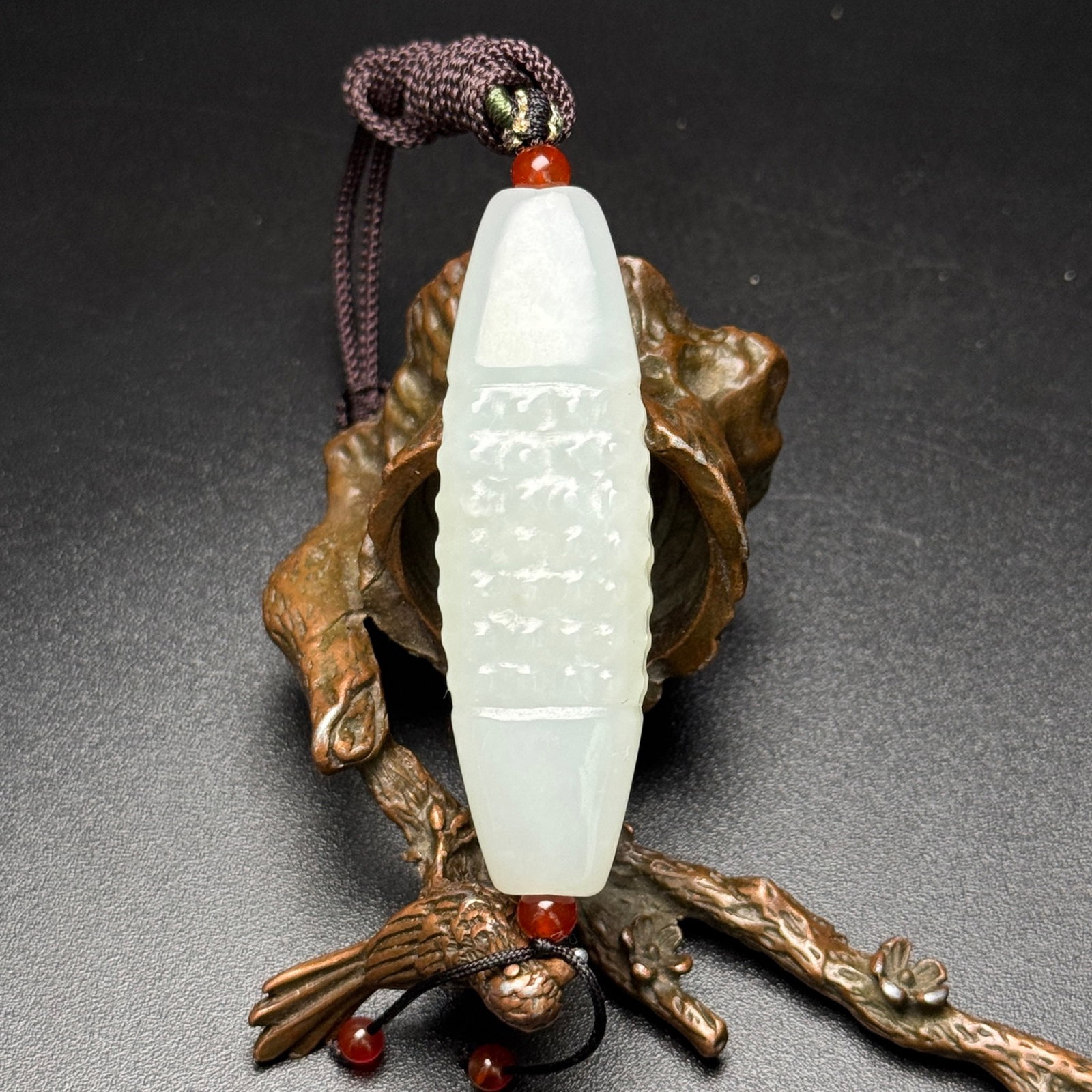 An Exquisite White Jade Pendant: An Exquisite White Jade Pendant,Qing Dynasty,China,Size:0.7inx0.5inx2.4in,Weight:32g 白玉挂件,中国清代
