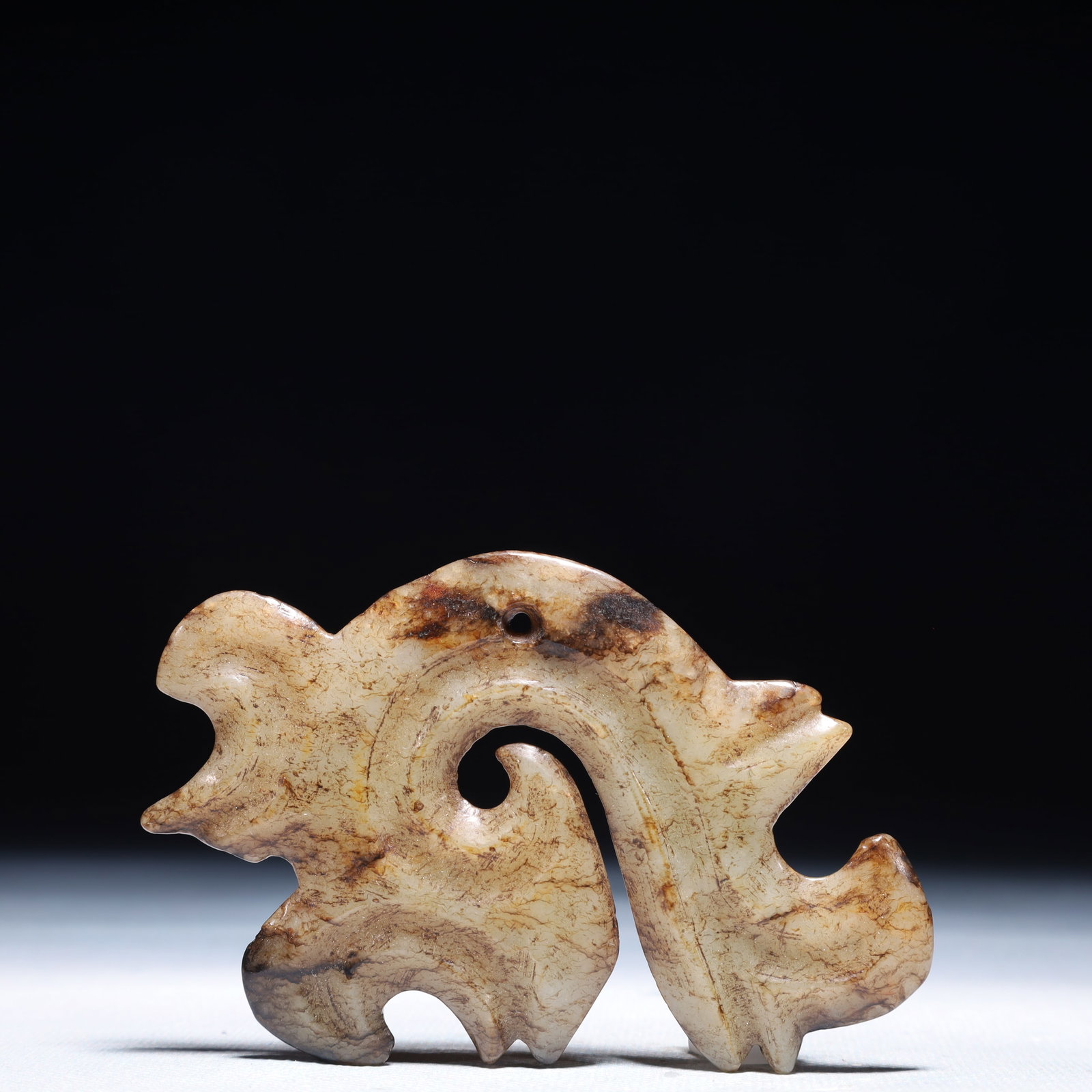 An Archaic Hongshan Culture White Jade Pendant: An Archaic Hongshan Culture White Jade Pendant,Ancient Time,China,Size:3.9inx2.6in,Weight:51.7g