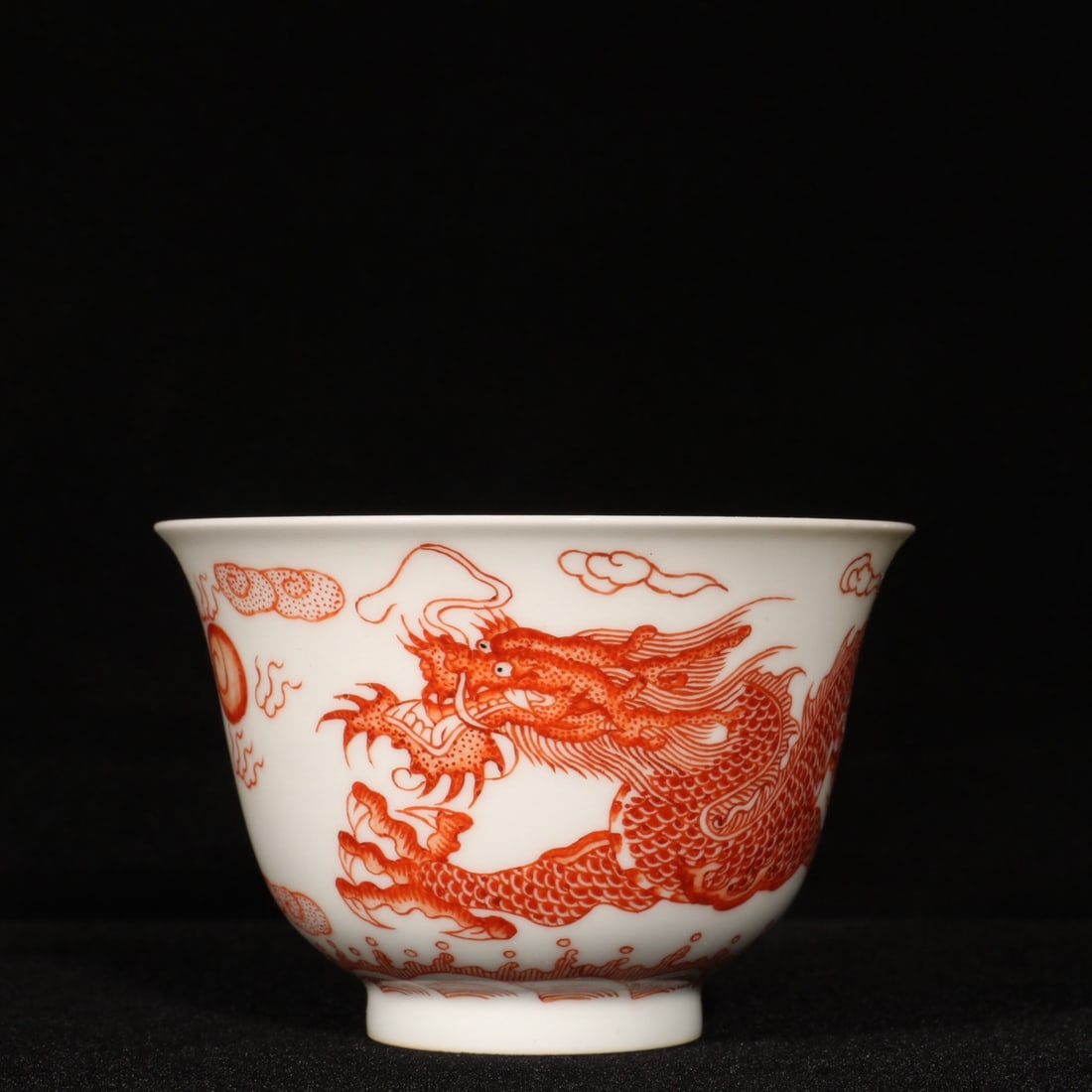 An Exquisite Iron-Red Auspicious Cloud and Dragon Pattern Cup: An Exquisite Iron-Red Auspicious Cloud and Dragon Pattern Cup,Qing Dynasty,China,Yongzheng Four-character Mark,Size:2.4inx3.5in