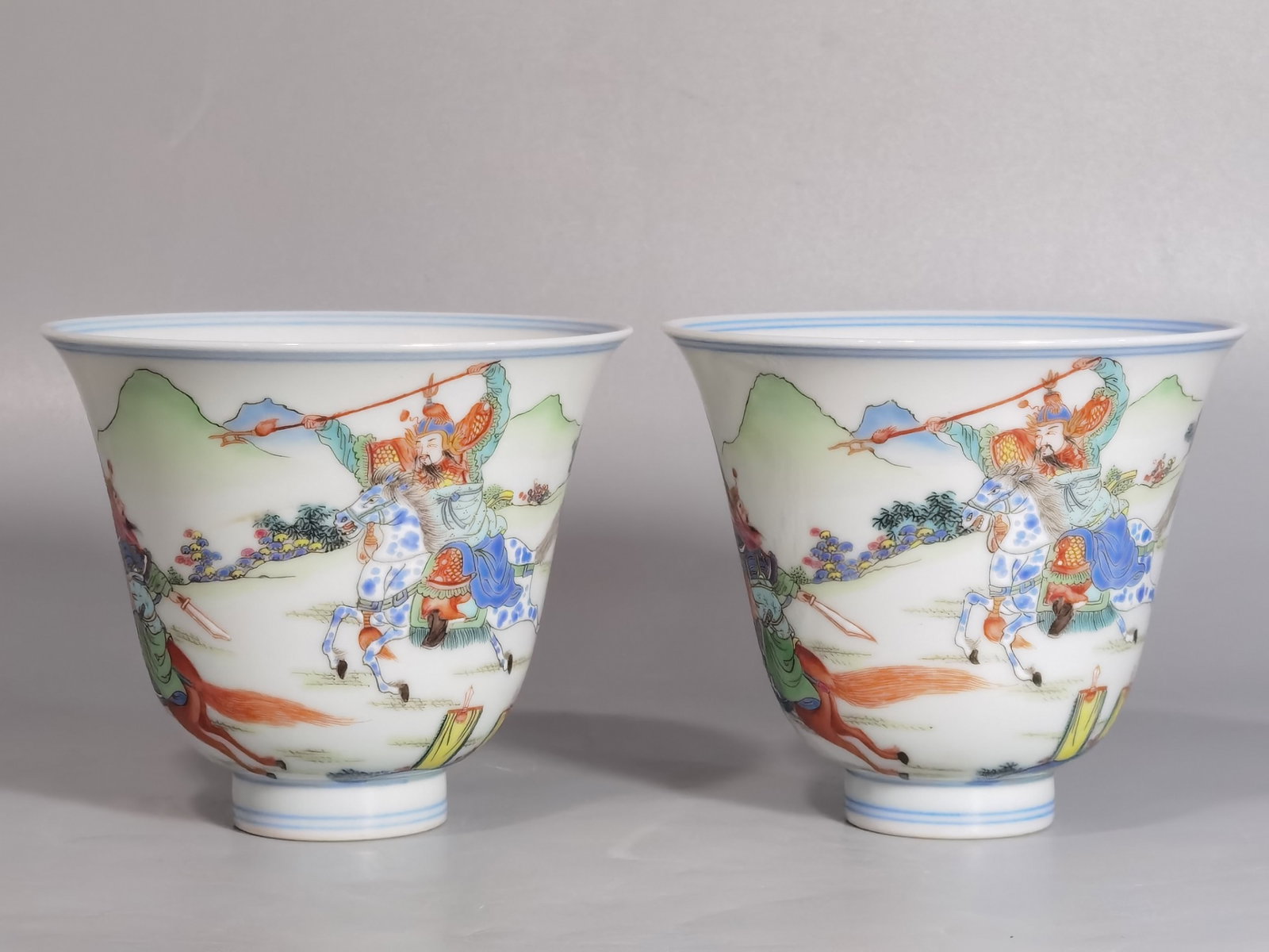 A Pair of Exquisite Character and Story Pattern Cups: A Pair of Exquisite Character and Story Pattern Cups,Qing Dynasty,China,Yongzheng Four-character Mark,Size:3.6inx3.2in 一对粉彩人物故事纹杯&