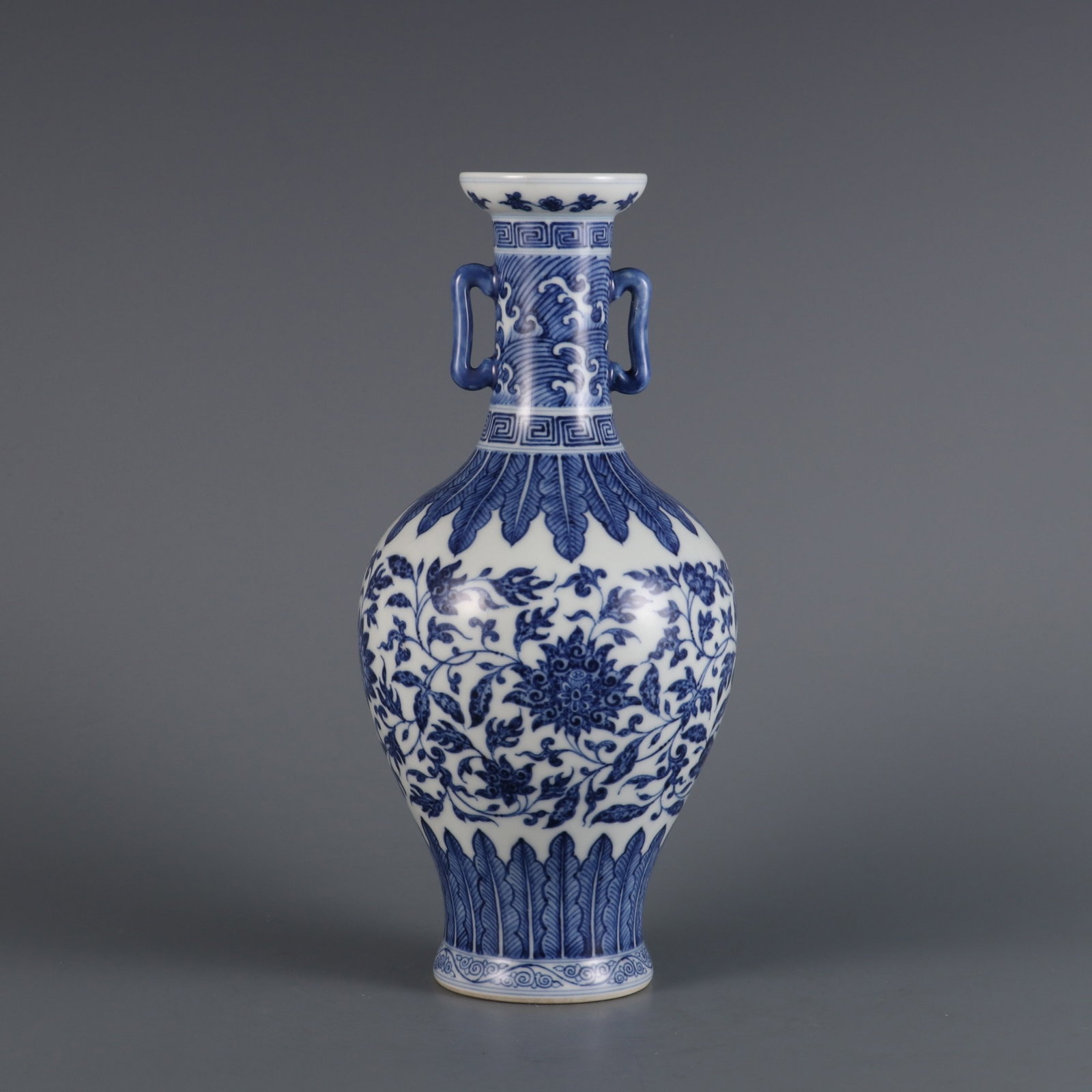 An Exquisite Blue and White Lotus Pattern Double-Ears Vase: An Exquisite Blue and White Lotus Pattern Double-Ears Vase,Qing Dynasty,China,Yongzheng Six-character Mark,Size:10.2inx4.5in 青花缠枝莲纹双耳瓶,&#