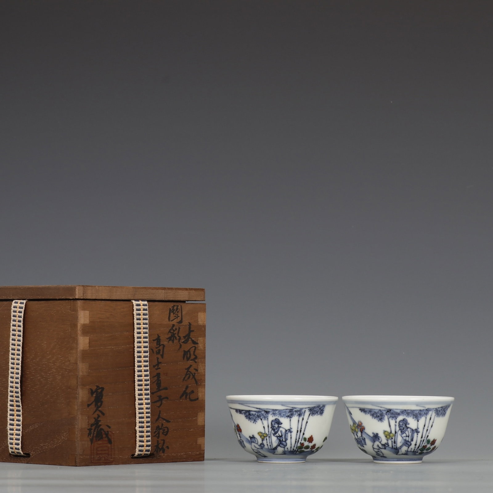A Pair of Exquisite Doucai Character and Story Pattern Cups (1 of 9)