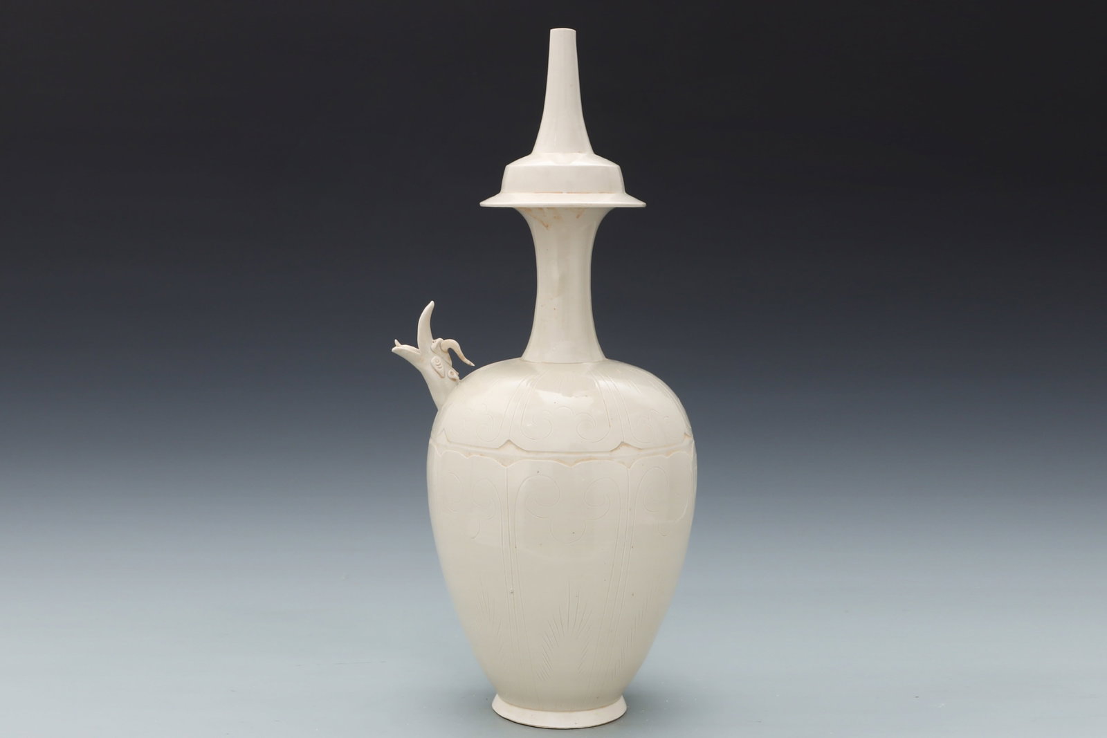 A Huge Ding yao White Glazed Flower Pattern Vase: A Huge Ding yao White Glazed Flower Pattern Vase,Song Dynasty,China,Size:21.5inx9.8in 定窑白釉花卉纹瓶,中国宋代