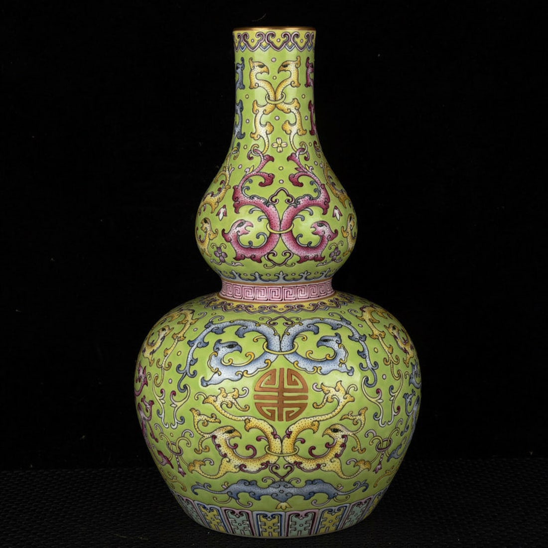 An Exquisite Green Ground Enamel Painted Gold Bats and Peach Pattern Gourd-Shaped Vase: An Exquisite Green Ground Enamel Painted Gold Bats and Peach Pattern Gourd-Shaped Vase,Qing Dynasty,China,Qianlong Six-character Mark,Size:11.4inx7.1in 绿地珐琅彩描