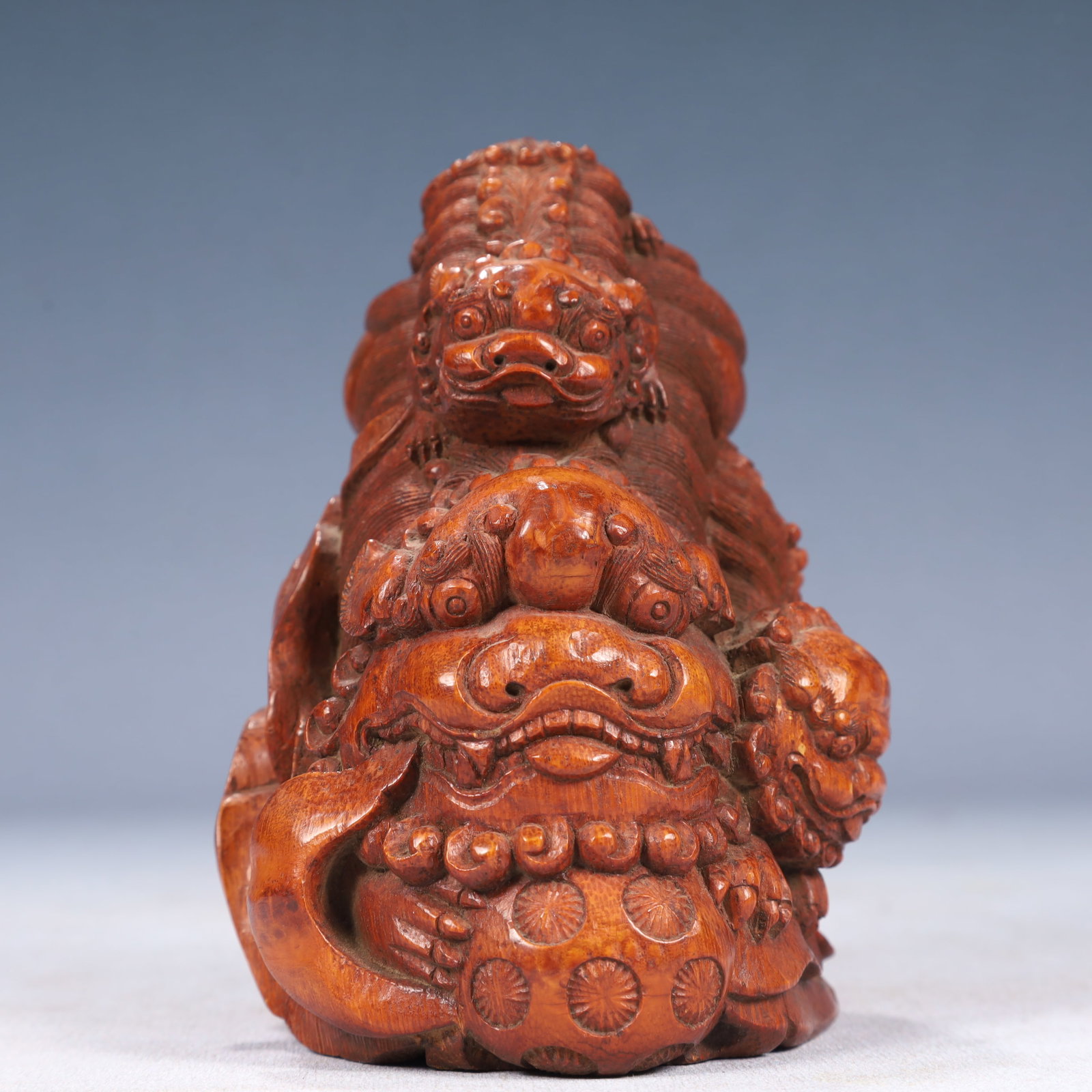 An Exquisite Bamboo Lion Ornament: An Exquisite Bamboo Lion Ornament,Qing Dynasty, China,Size:3.9inx3.5inx4.7in,Weight:350g 竹雕狮子摆件,中国清代
