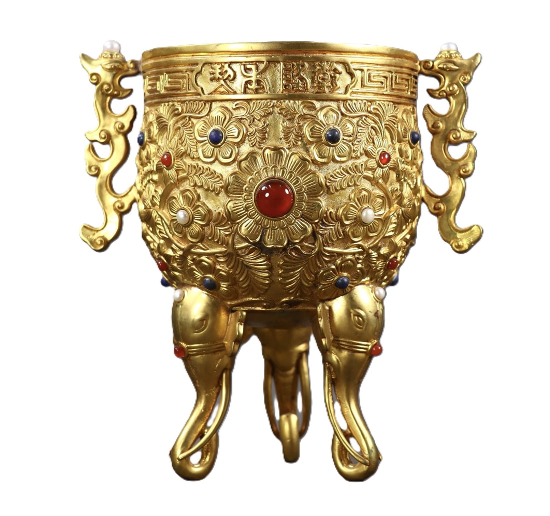 An Exquisite Gilt Bronze Flower Pattern Double-Ears and Tripod Cup,Inlaid Gems: An Exquisite Gilt Bronze Flower Pattern Double-Ears and Tripod Cup,Inlaid Gems,Qing Dynasty,China,Size:7.3inx6.7inx4.7in,Weight:1616g 铜鎏金花卉纹双耳&#