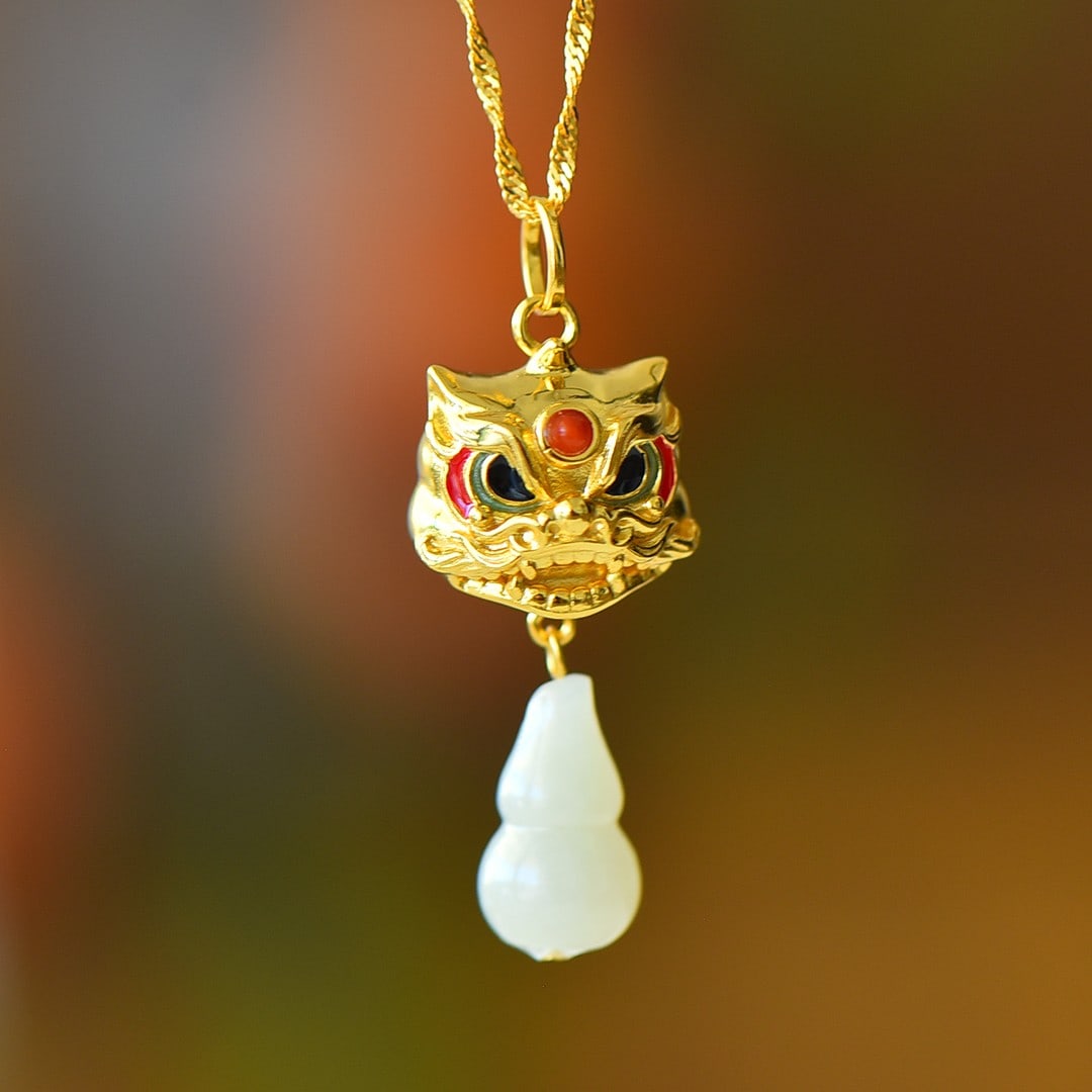 An Exquisite Sterling Silver-Gold Plated Inlaid White Jade Pendant: An Exquisite Sterling Silver-Gold Plated Inlaid White Jade Pendant,Size:0.4inx0.6in 纯银镀金镶白玉吊坠