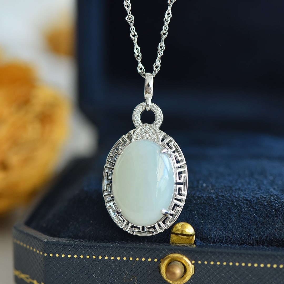 An Exquisite Sterling Silver Inlaid White Jade Pendant: An Exquisite Sterling Silver Inlaid White Jade Pendant, 纯银镶白玉吊坠