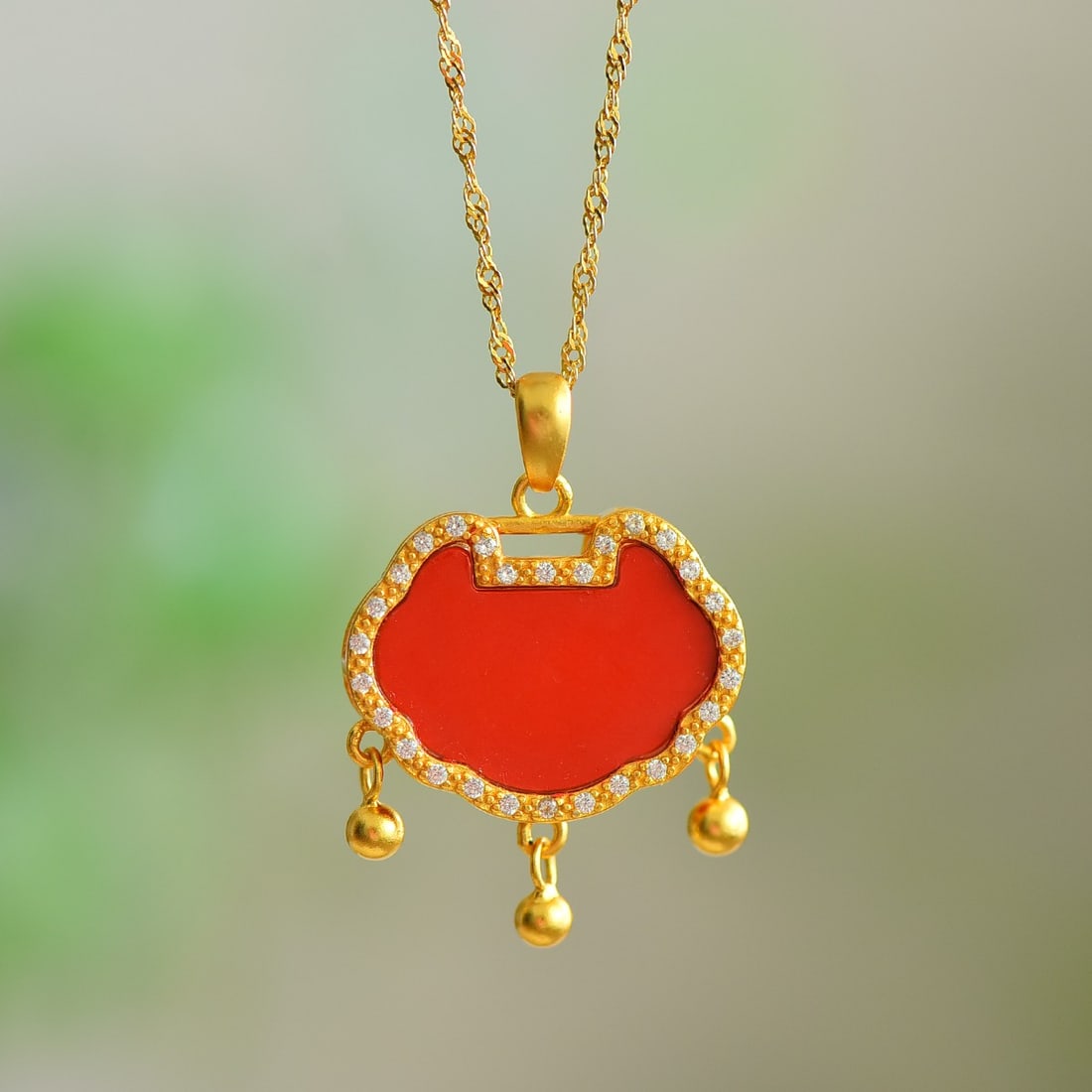An Exquisite Sterling Silver-Gold Plated Inlaid Cinnabar Pendant,Inlaid Diamond: An Exquisite Sterling Silver-Gold Plated Inlaid Cinnabar Pendant,Inlaid Diamond,Size:0.5inx0.7in 寓意:吉祥如意,事事顺心