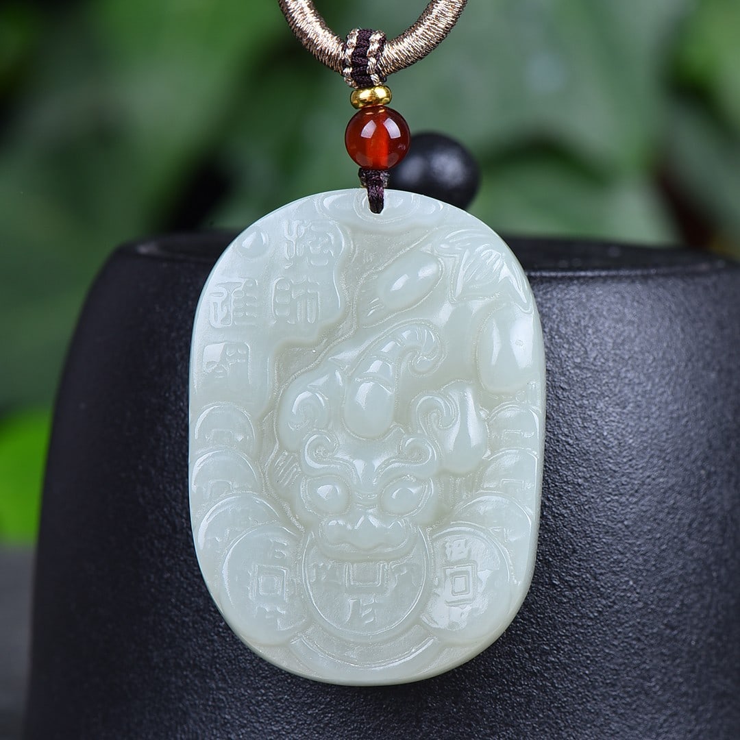 An Exquisite White Jade Wealth-Attracting Creature Pendant: An Exquisite White Jade Wealth-Attracting Creature Pendant,Size:1.4inx1.9in 白玉貔貅挂件