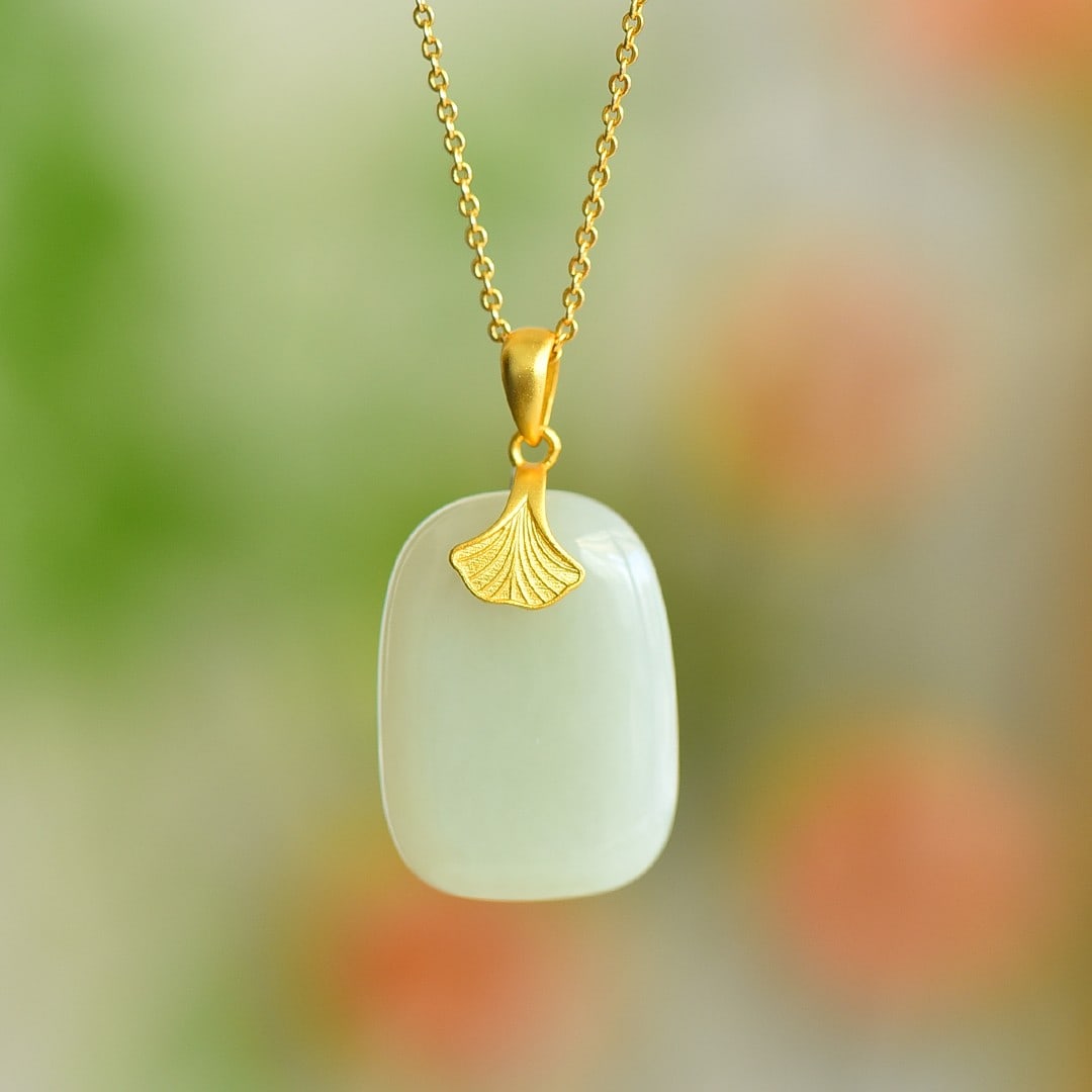 An Exquisite Sterling Silver-Gold Plated Inlaid White Jade Pendant: An Exquisite Sterling Silver-Gold Plated Inlaid White Jade Pendant 纯银镀金镶白玉吊坠