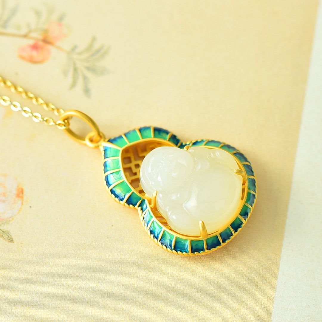 An Exquisite Sterling Silver-Gold Plated Inlaid White Jade Pendant: An Exquisite Sterling Silver-Gold Plated Inlaid White Jade Pendant,Size:0.5inx0.6in 纯银镀金镶白玉吊坠