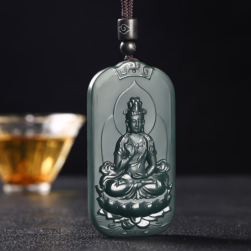 An Exquisite Cyan jade Statue of Avalokitesvara Pendant: An Exquisite Cyan jade Statue of Avalokitesvara Pendant,Size:2.7inx1.5inx0.3in 青玉观音像挂件