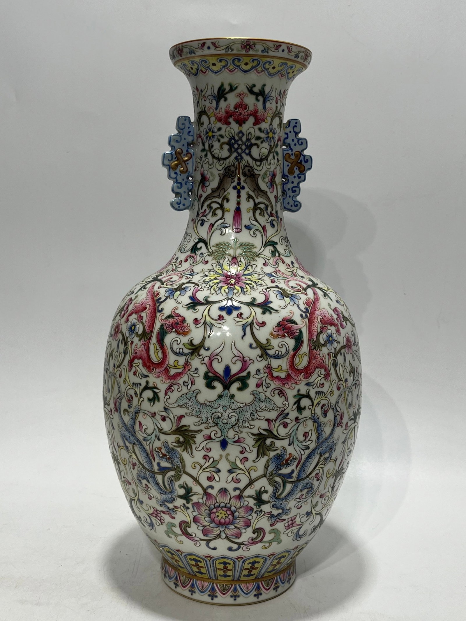 A Rare Famille-Rose Painted Gold Lotus and Dragon Pattern Double-Ears Vase: A Rare Famille-Rose Painted Gold Lotus and Dragon Pattern Double-Ears Vase,Qing Dynasty,China,Qianlong Six-character Mark,Size:14.9in 粉彩描金缠枝莲龙&#