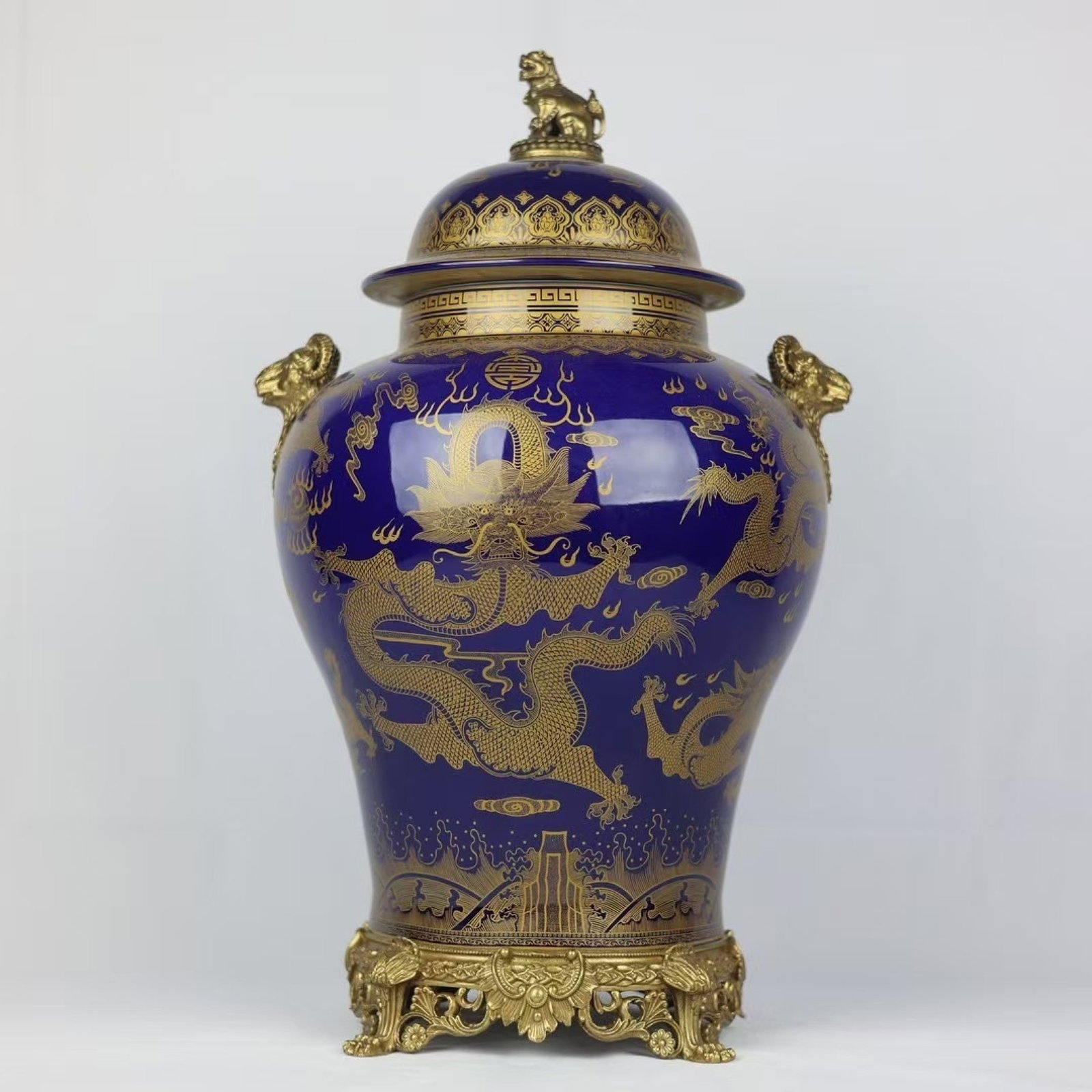 A Huge Ji Blue Glazed Inlaid Bronze Painted Gold Auspicious Cloud and Dragon Pattern Beast-Ears Jar: A Huge Ji Blue Glazed Inlaid Bronze Painted Gold Auspicious Cloud and Dragon Pattern Beast-Ears Jar with Cover,Qing Dynasty,China,Qianlong Six-character Mark,Size:20.1inx11in 霁蓝釉&