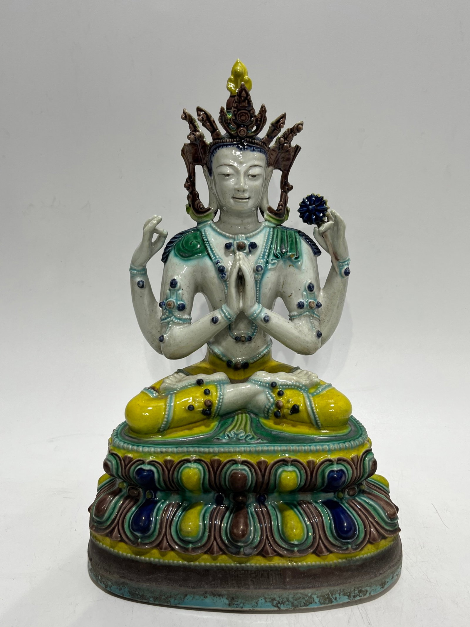 A Solemn Biscuit Four-arms Buddha Statue: A Solemn Biscuit Four-arms Buddha Statue,Qing Dynasty,China,Size:11in 素三彩四臂佛像,中国清代