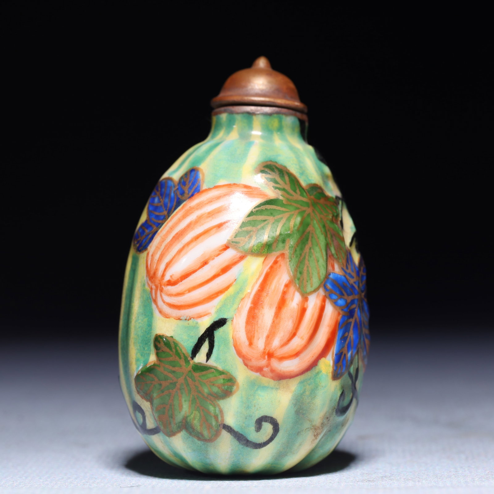 An Exquisite Famille-Rose Melon and Fruit Pattern Snuff Bottle: An Exquisite Famille-Rose Melon and Fruit Pattern Snuff Bottle,Qing Dynasty,China,Qianlong Four-character Mark,Size:1.6inx1.2inx2.8in,Weight:79.3g