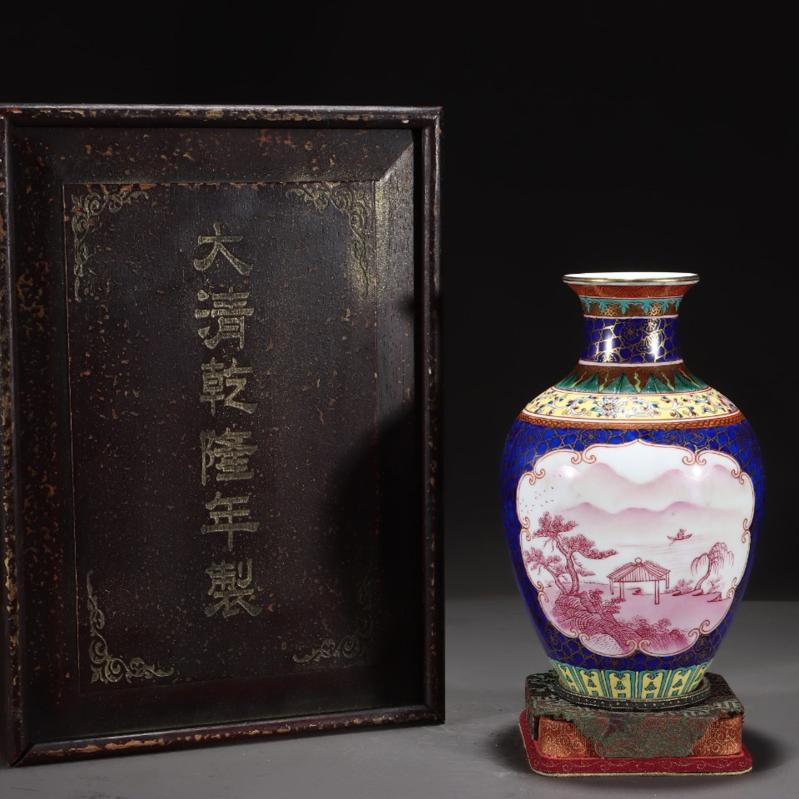 An Exquisite Famille-Rose Blue Glazed Iron-Red Painted Gold Landscape Pattern Vase: An Exquisite Famille-Rose Blue Glazed Iron-Red Painted Gold Landscape Pattern Vase,Qing Dynasty,China,Qianlong Six-character Mark,Size:8.9inx5.5in