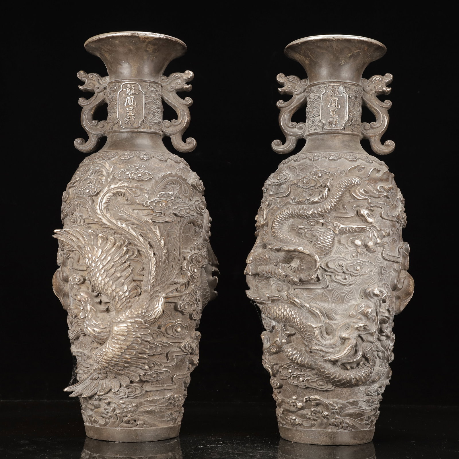 A Pair of Huge Silver-Plated Bronze Dragon and Phoenix Pattern Double-Ears Vases: A Pair of Huge Silver-Plated Bronze Dragon and Phoenix Pattern Double-Ears Vases,Ming Dynasty, China,Xuande Four-character Mark,Size:7.9inx6.7inx18.9in,Weight:12150g
