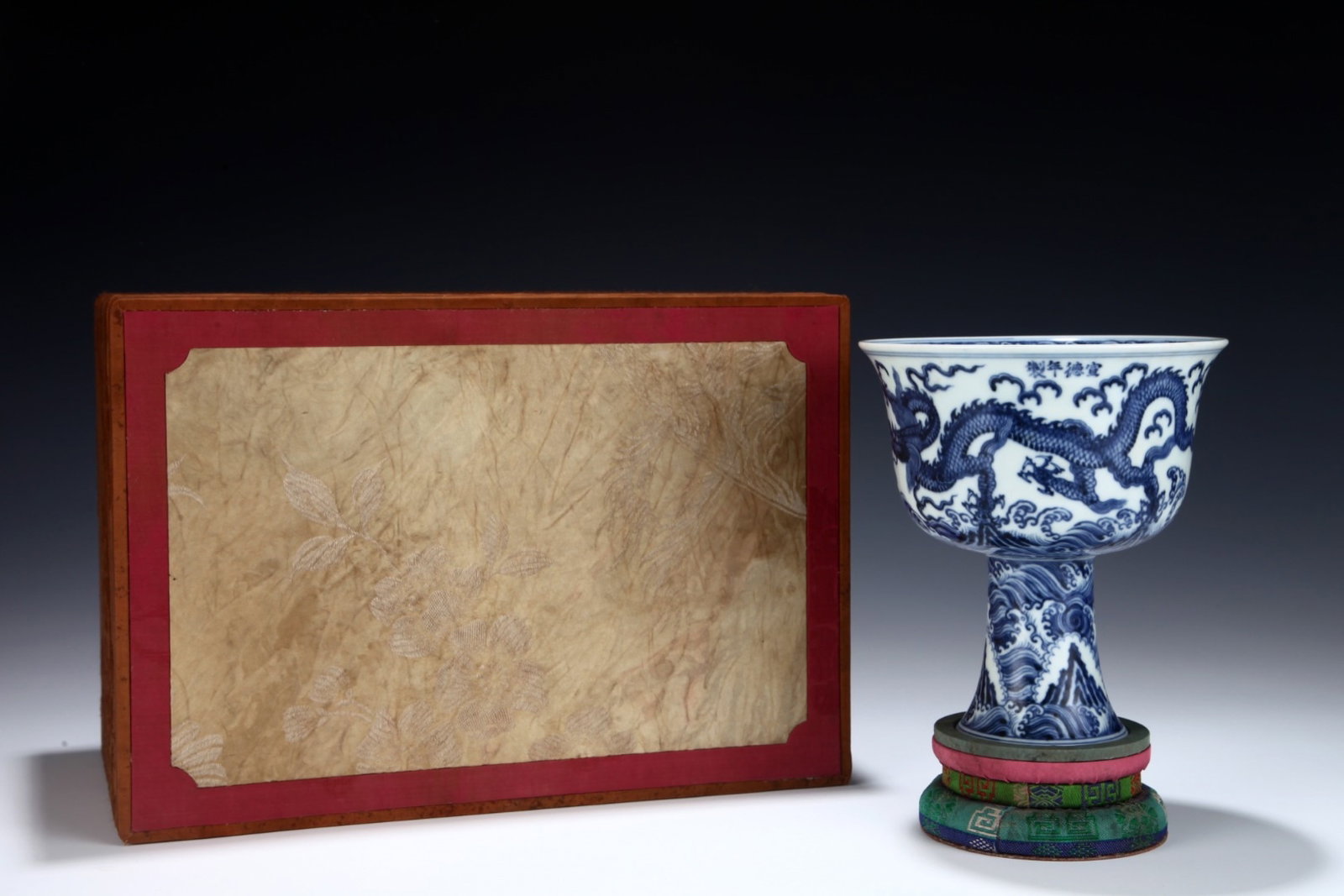 An Exquisite Blue and White Seawater and Dragon Pattern Stem Bowl: An Exquisite Blue and White Seawater and Dragon Pattern Stem Bowl,Ming Dynasty,China,Xuande Four-character Mark,Size:6.9inx6.1in