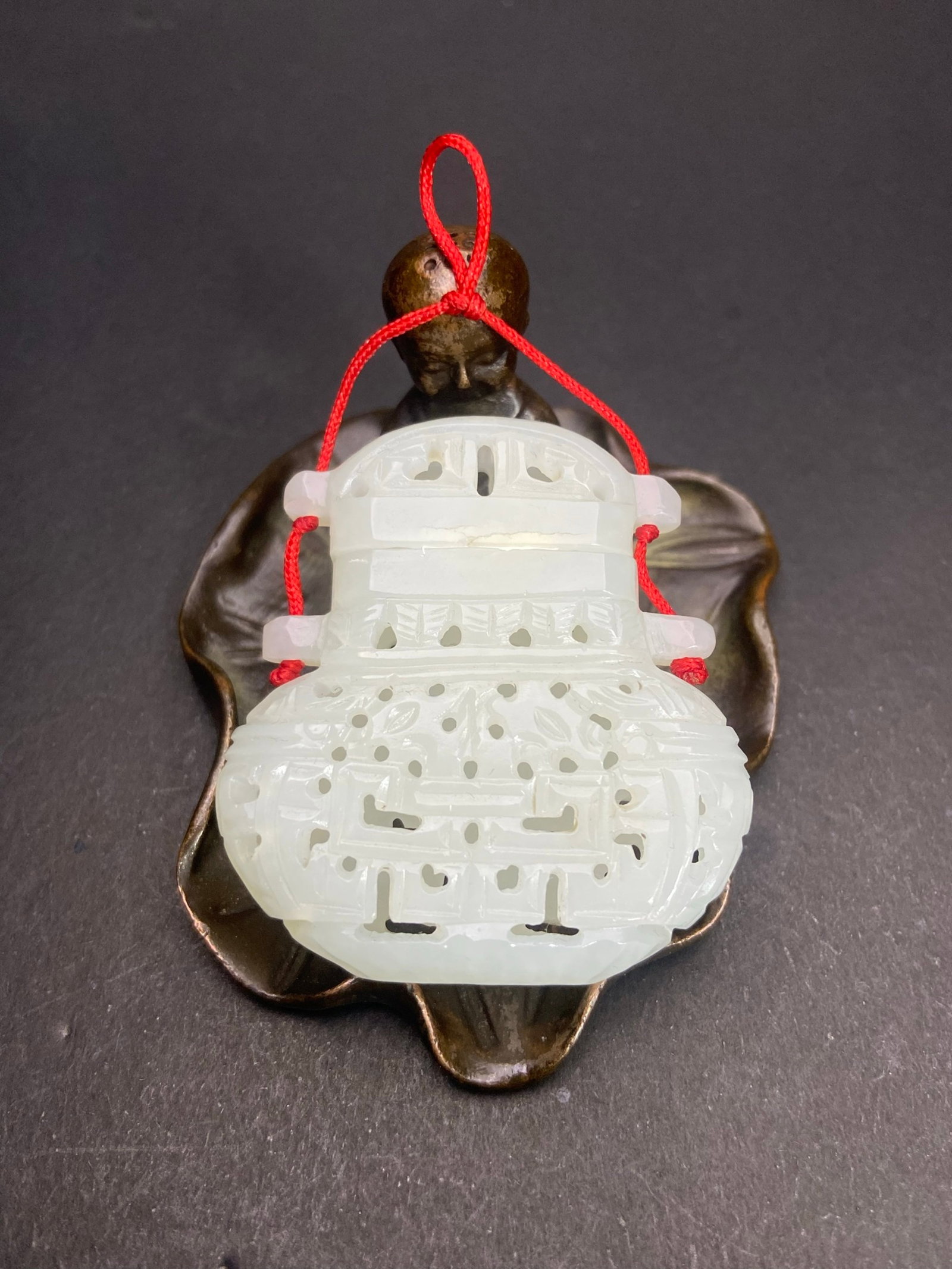 An Exquisite White Jade Hollow Pendant: An Exquisite White Jade Hollow Pendant,Qing Dynasty,China,Size:48mmx45mmx12mm,Weight:28g 白玉镂空挂件,中国清代