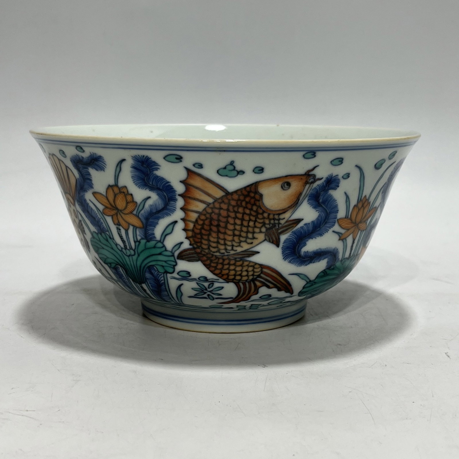 An Exquisite Wucai Hornwort Pattern Bowl: An Exquisite Wucai Hornwort Pattern Bowl,Ming Dynasty,China,Jiajing Six-character Mark,Size:7.6in 五彩鱼藻纹碗,中国明代,嘉靖