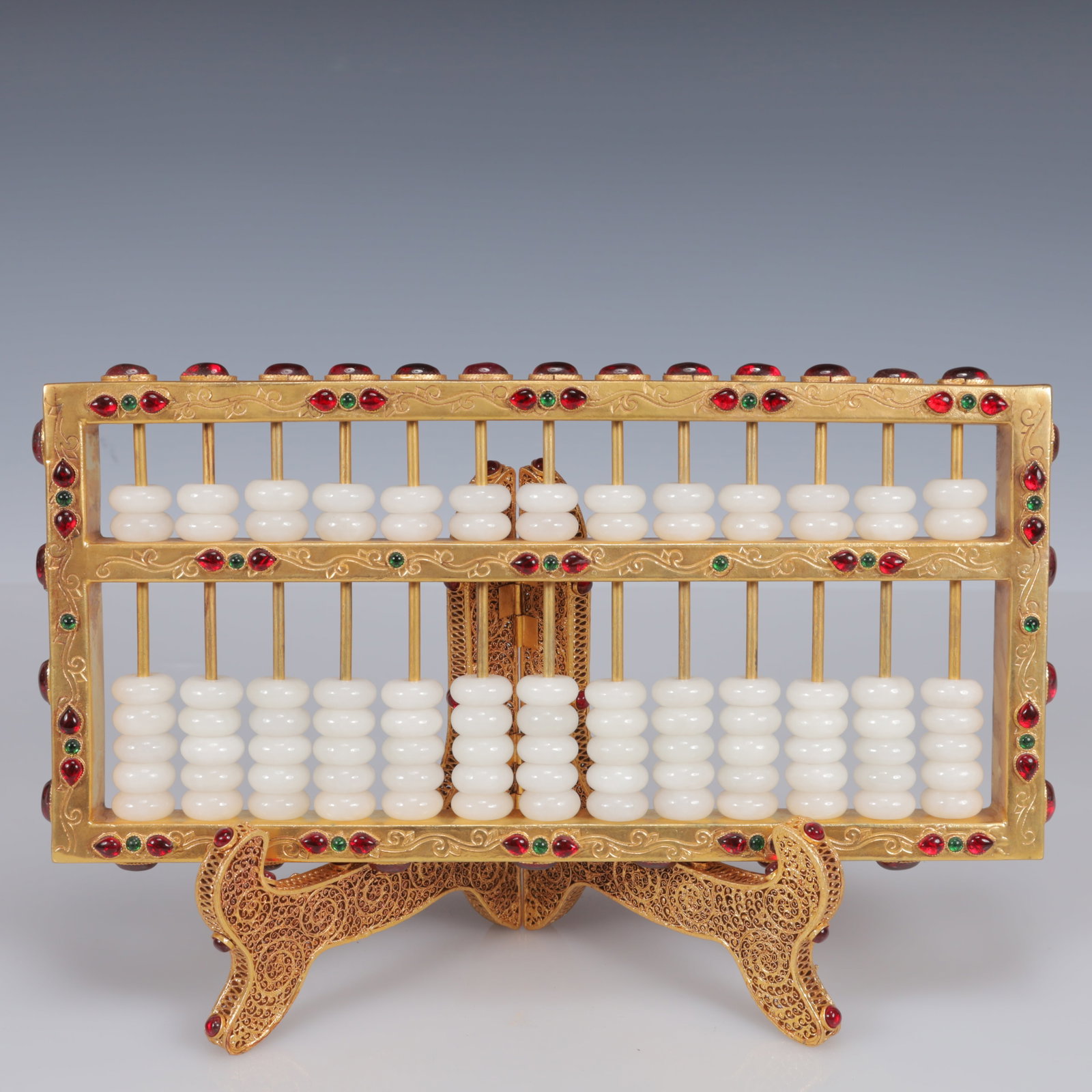 An Exquisite Filigree and Gilding Inlaid White Jade Suanpan,Inlaid Gems: An Exquisite Filigree and Gilding Inlaid White Jade Suanpan,Inlaid Gems,Qing Dynasty, China,Qianlong Four-Character Mark,Size:11.8inx4.3inx7.5in,Weight:1500g
