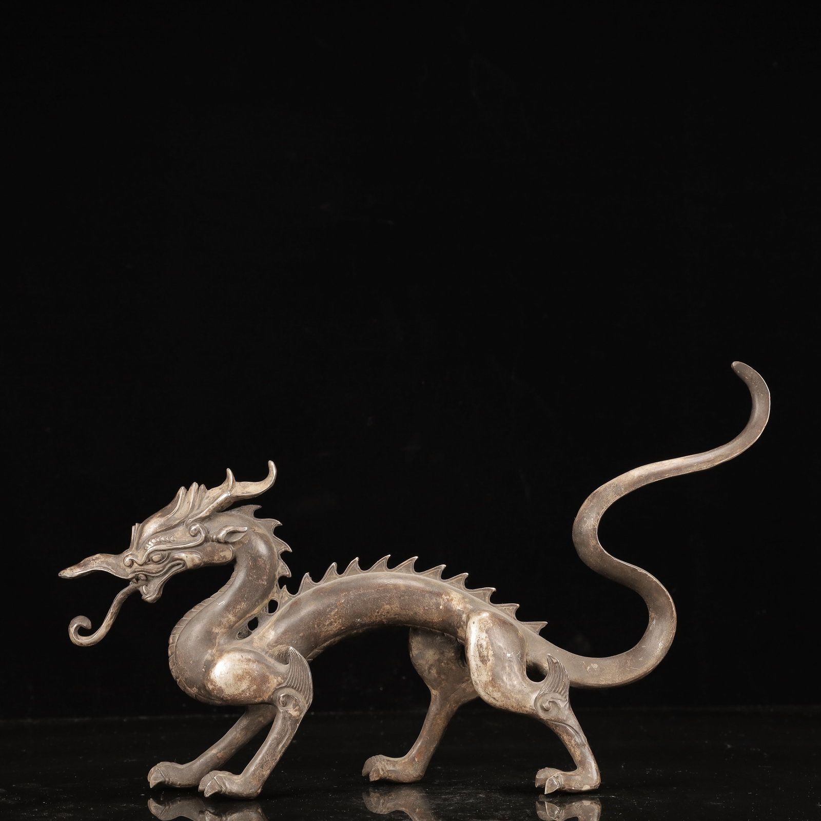 A Huge Silver-Plated Bronze Dragon Ornament: A Huge Silver-Plated Bronze Dragon Ornament,Qing Dynasty, China,Size:15.7inx3.1inx9.1in,Weight:1700g 铜镀银龙摆件,中国清代