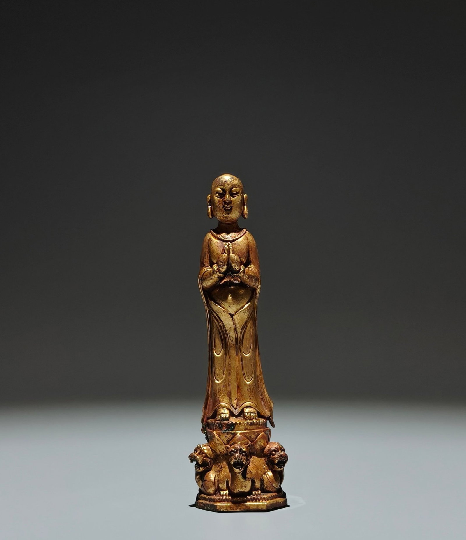 A Solemn Gilt Bronze Buddha Statue: A Solemn Gilt Bronze Buddha Statue,Tang Dynasty,China,Size:5.9inx1.6inx1.2in 铜鎏金佛像,中国唐代