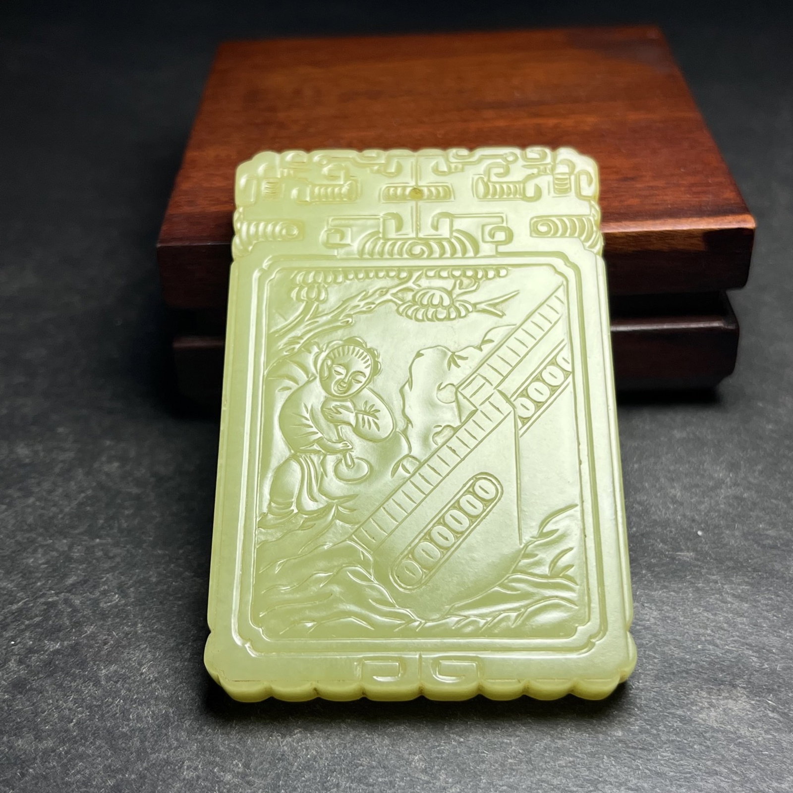 An Exquisite Yellow Jade Landscape and Figure Pattern Pendant,With Poem: An Exquisite Yellow Jade Landscape and Figure Pattern Pendant,With Poem,Qing Dynasty,China,Size:47mmx7mmx71mm,Weight:64g 黄玉山水人物纹挂件,४